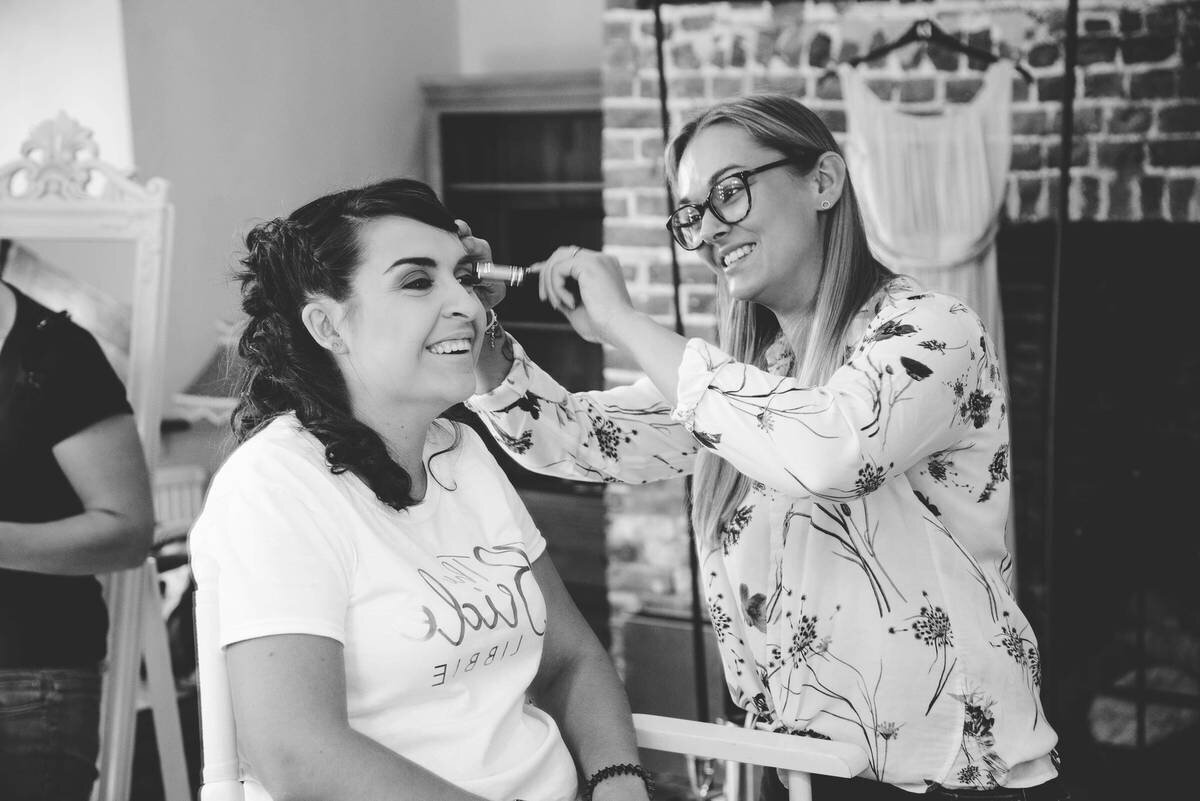 Stephanie alexandra doing makeup on bride