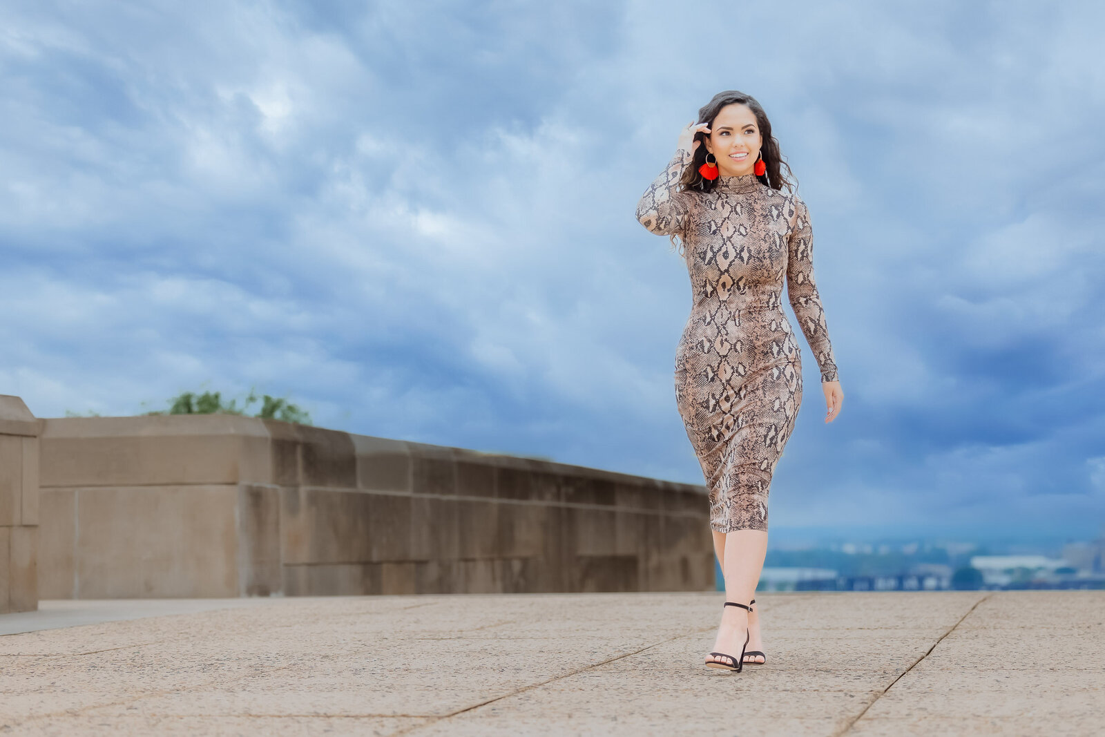 senior girl walking on rooftop in kansas city MO