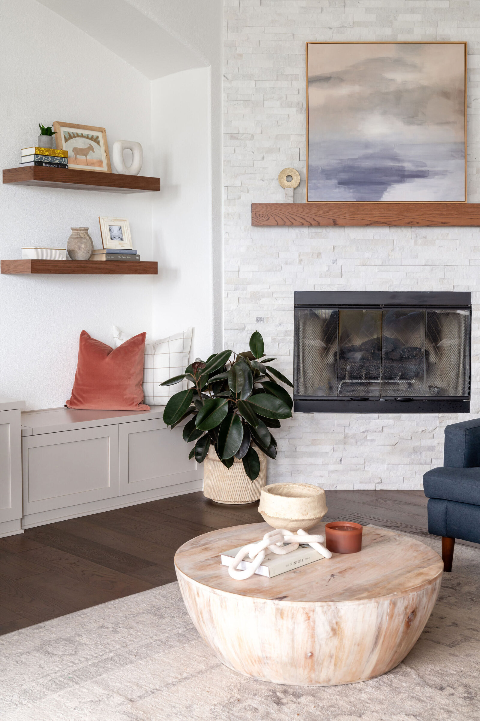Nuela_Designs_White_Stone_Fireplace_Living_Room