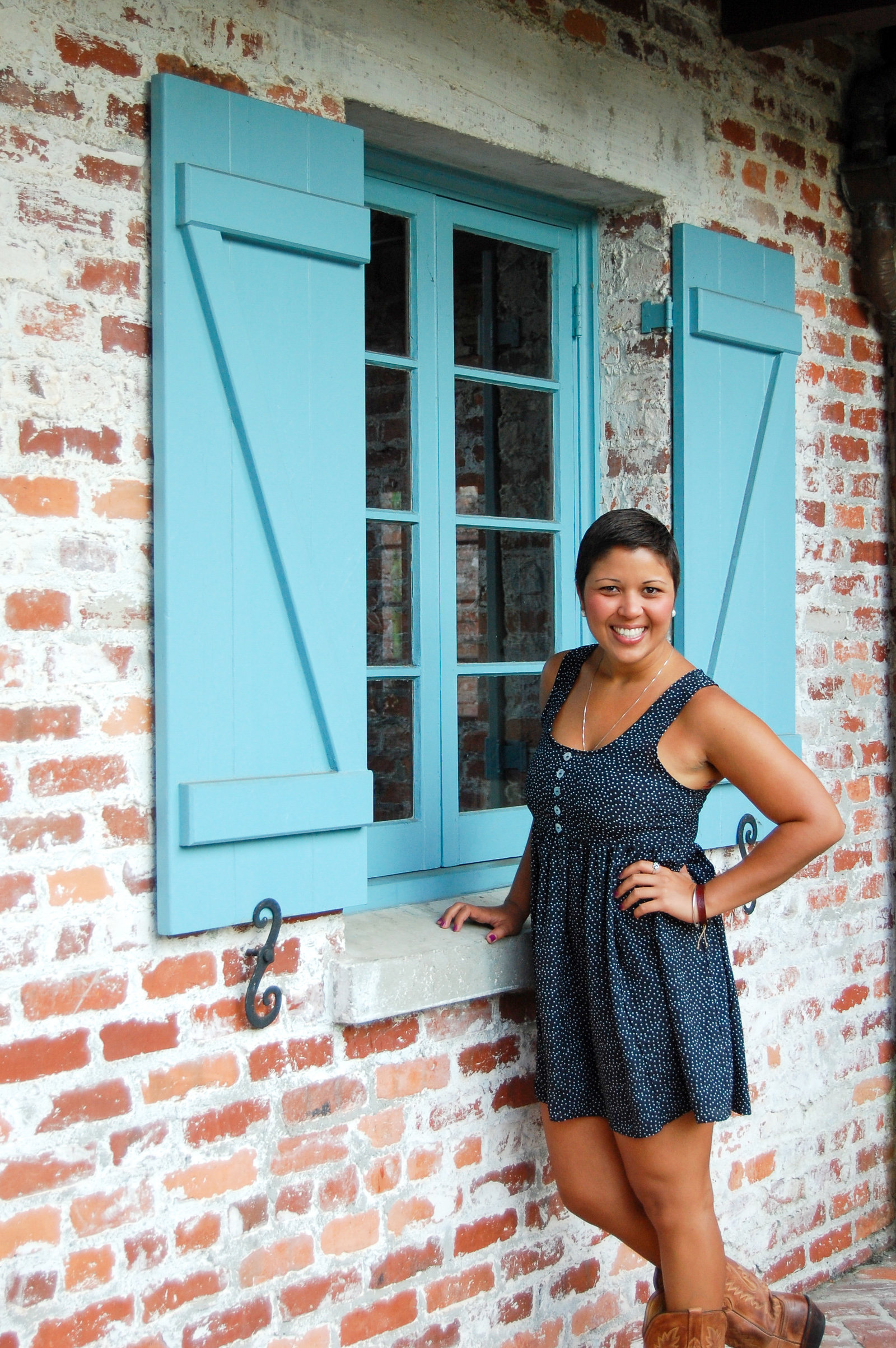 Girl teal shutters  Casa Feliz Winter Park Florida