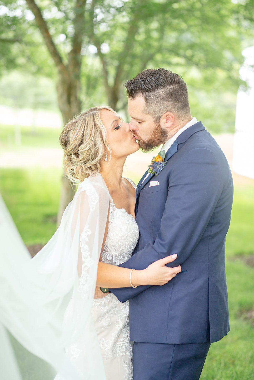 bride and groom kissing