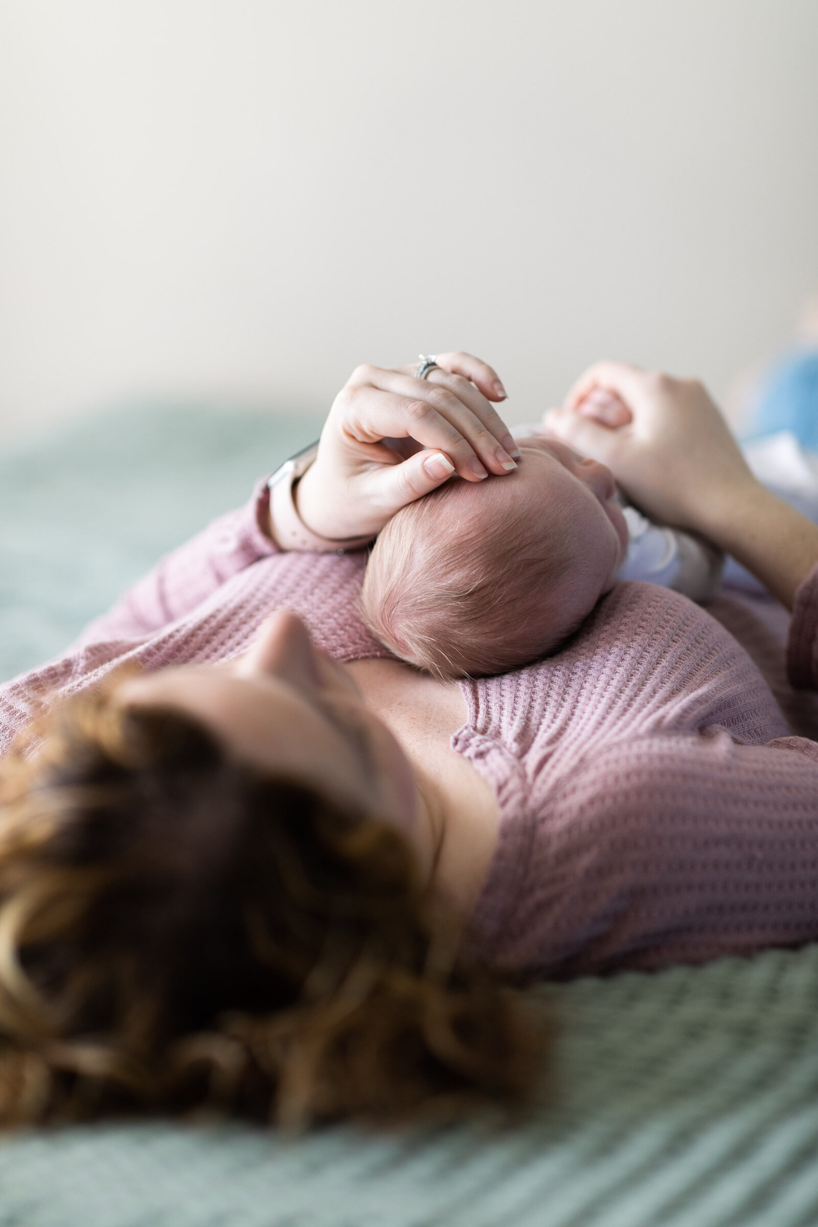Kansas_City_Newborn_Photography_mother_baby_laying_down-13