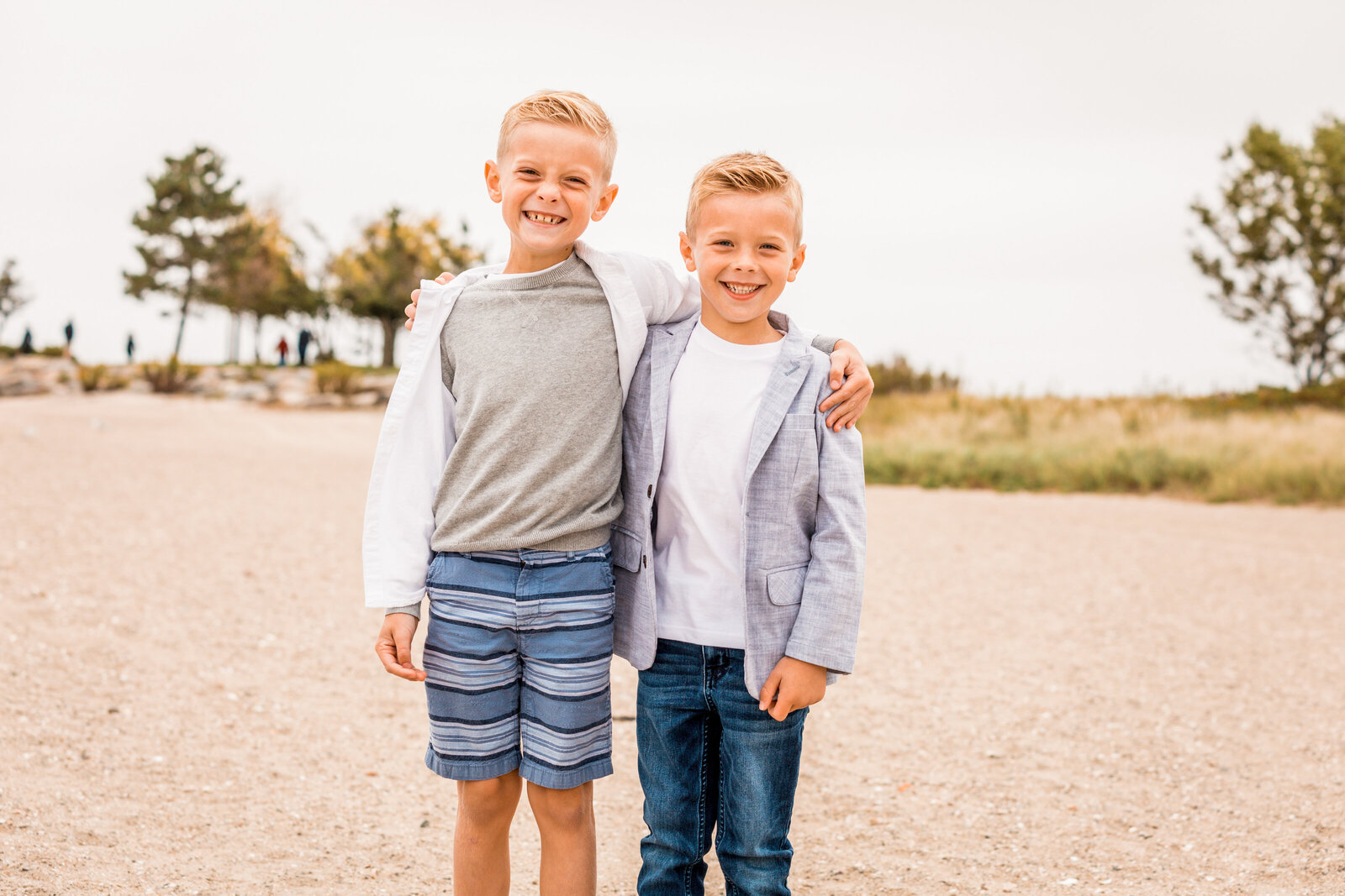 brothers hugging on westport beach