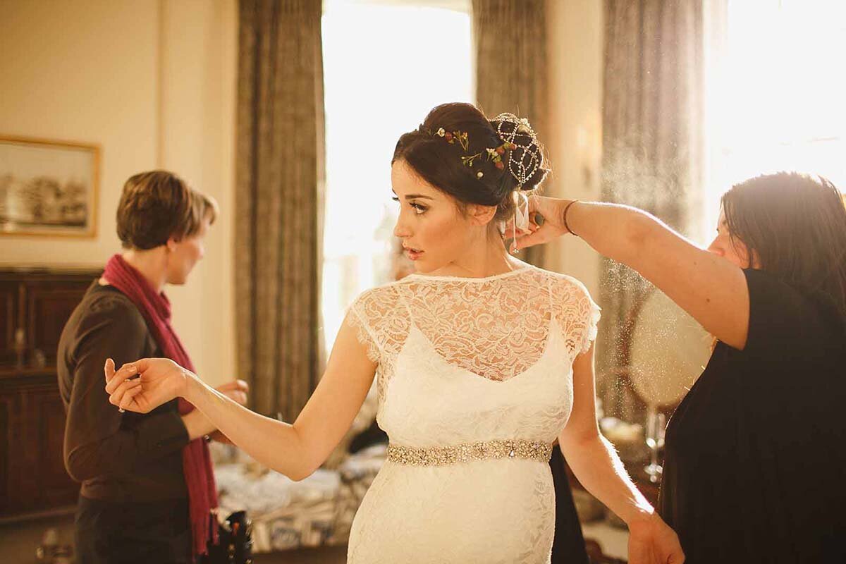 Bride getting ready in the Park room at Iscoyd