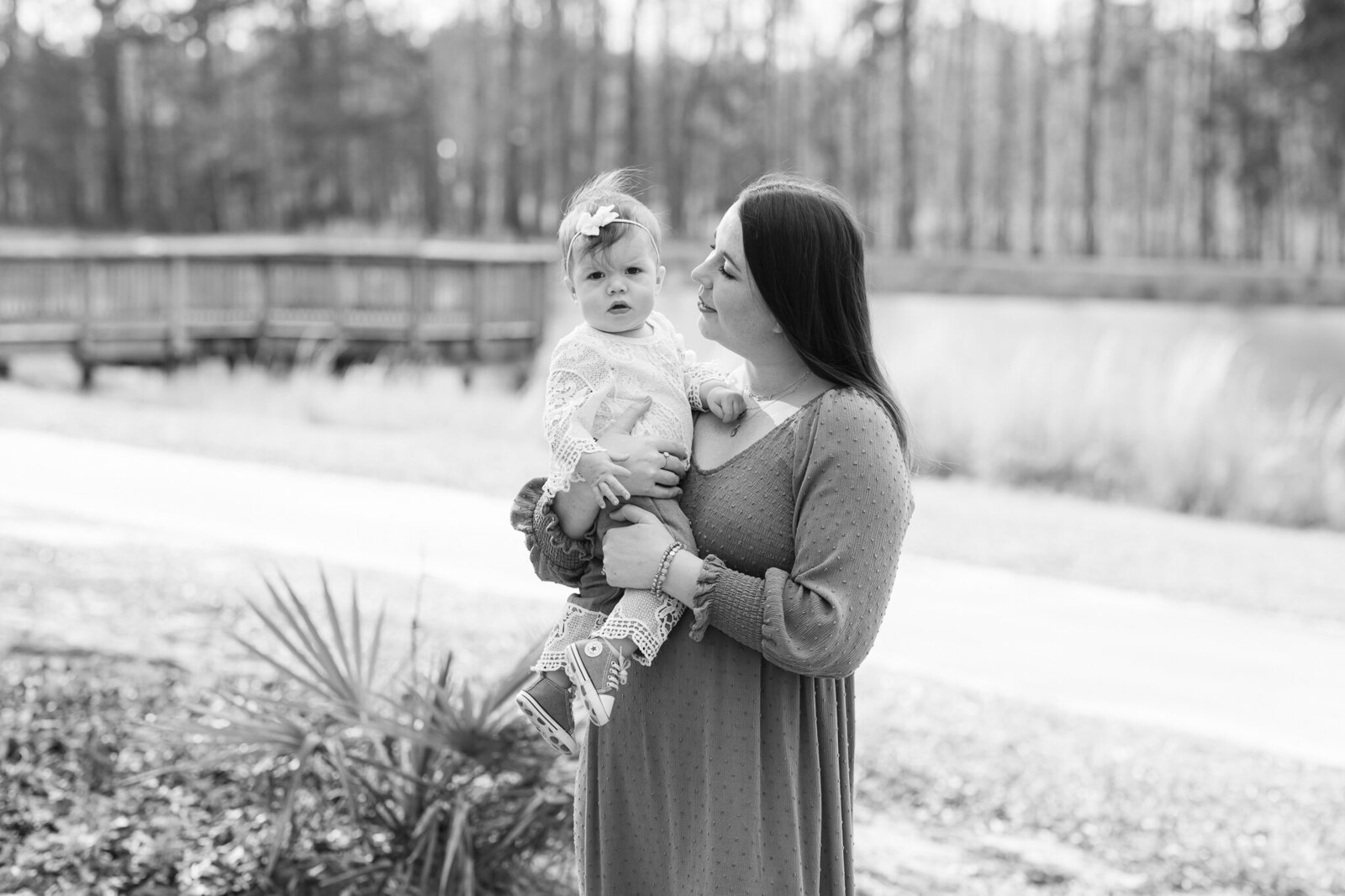 A black and white image of a mom and her daughter during a family photoshoot in Savannah, GA