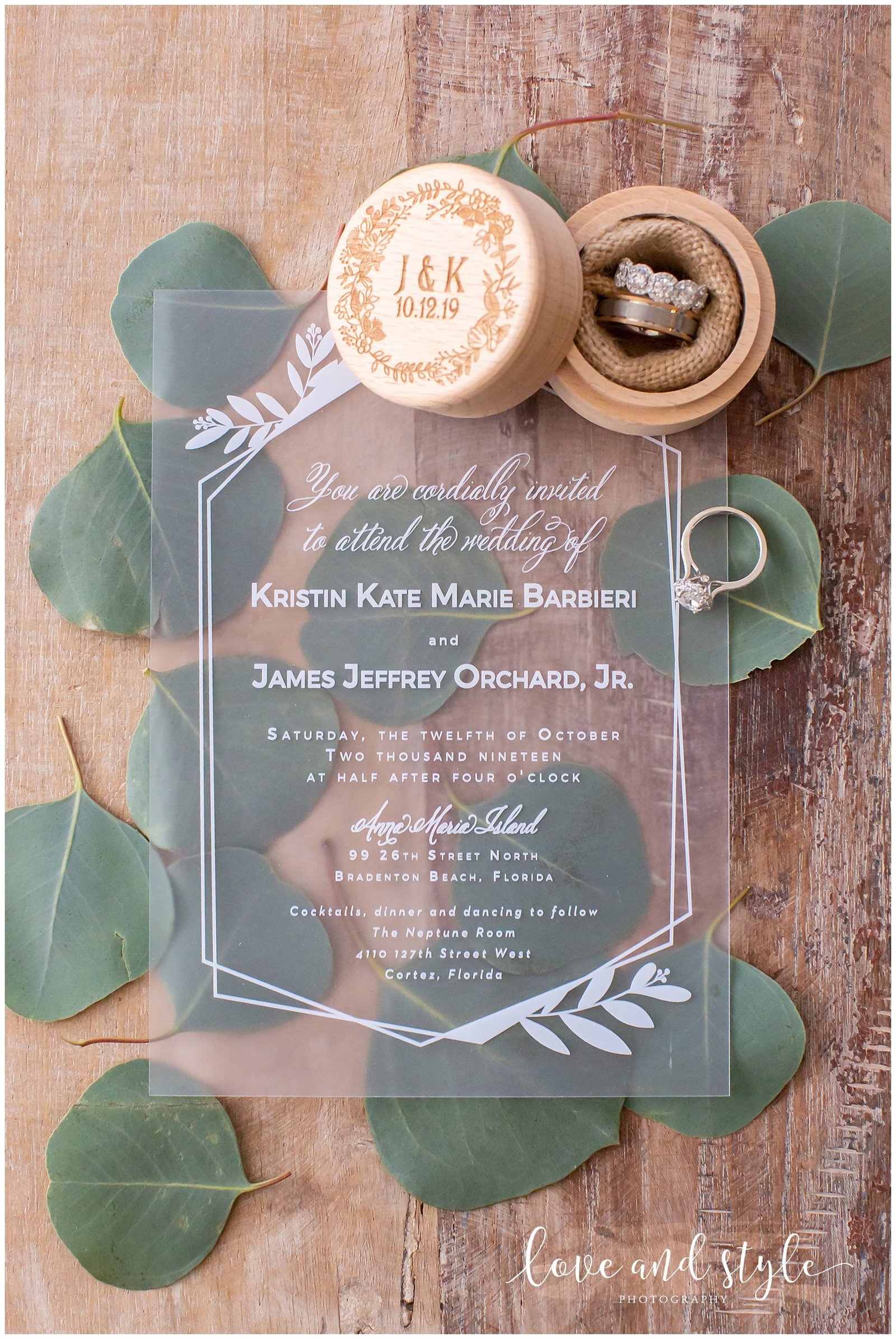 Detail Wedding Photo of wedding invitation and rings