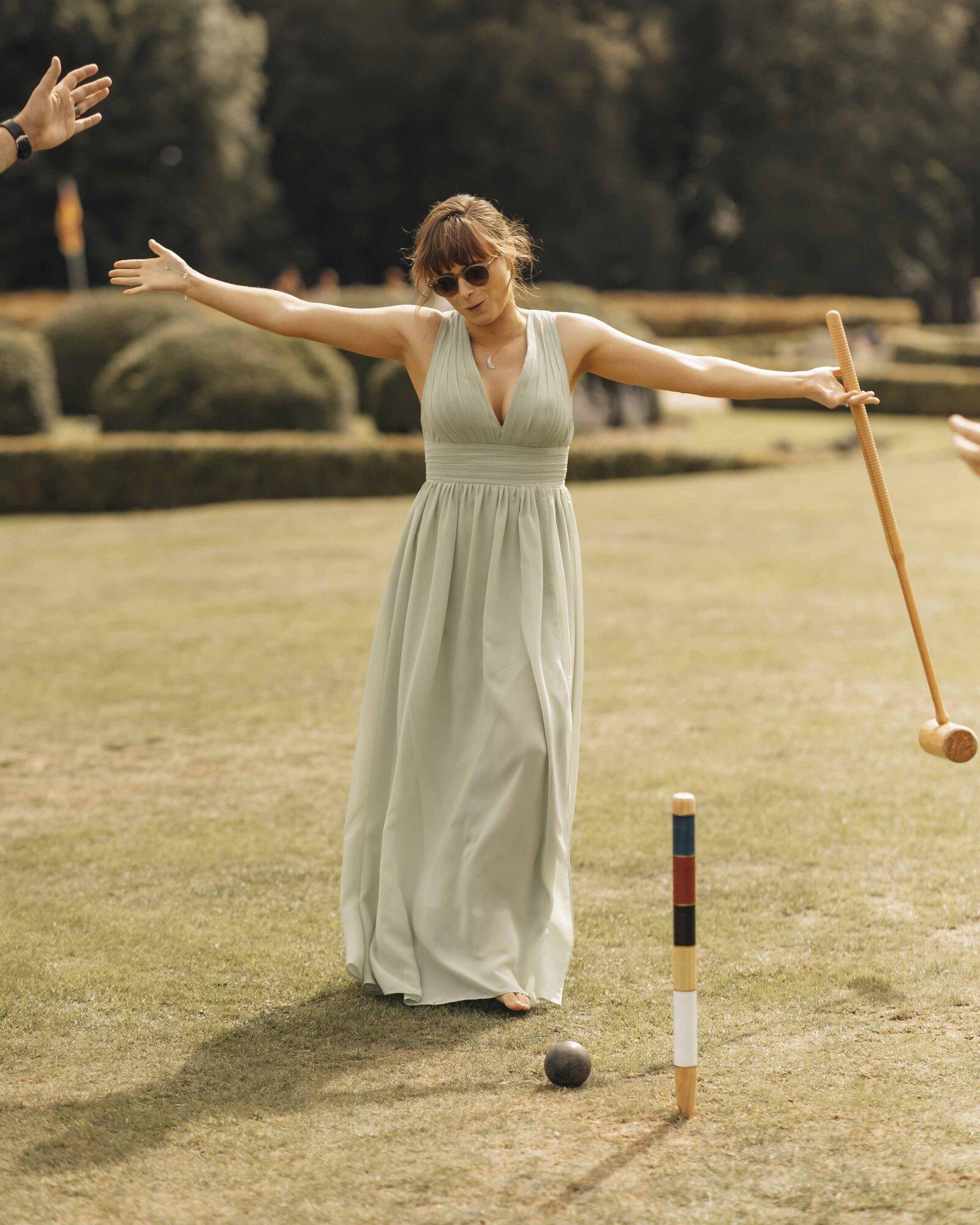 bridesmaid playing croquet
