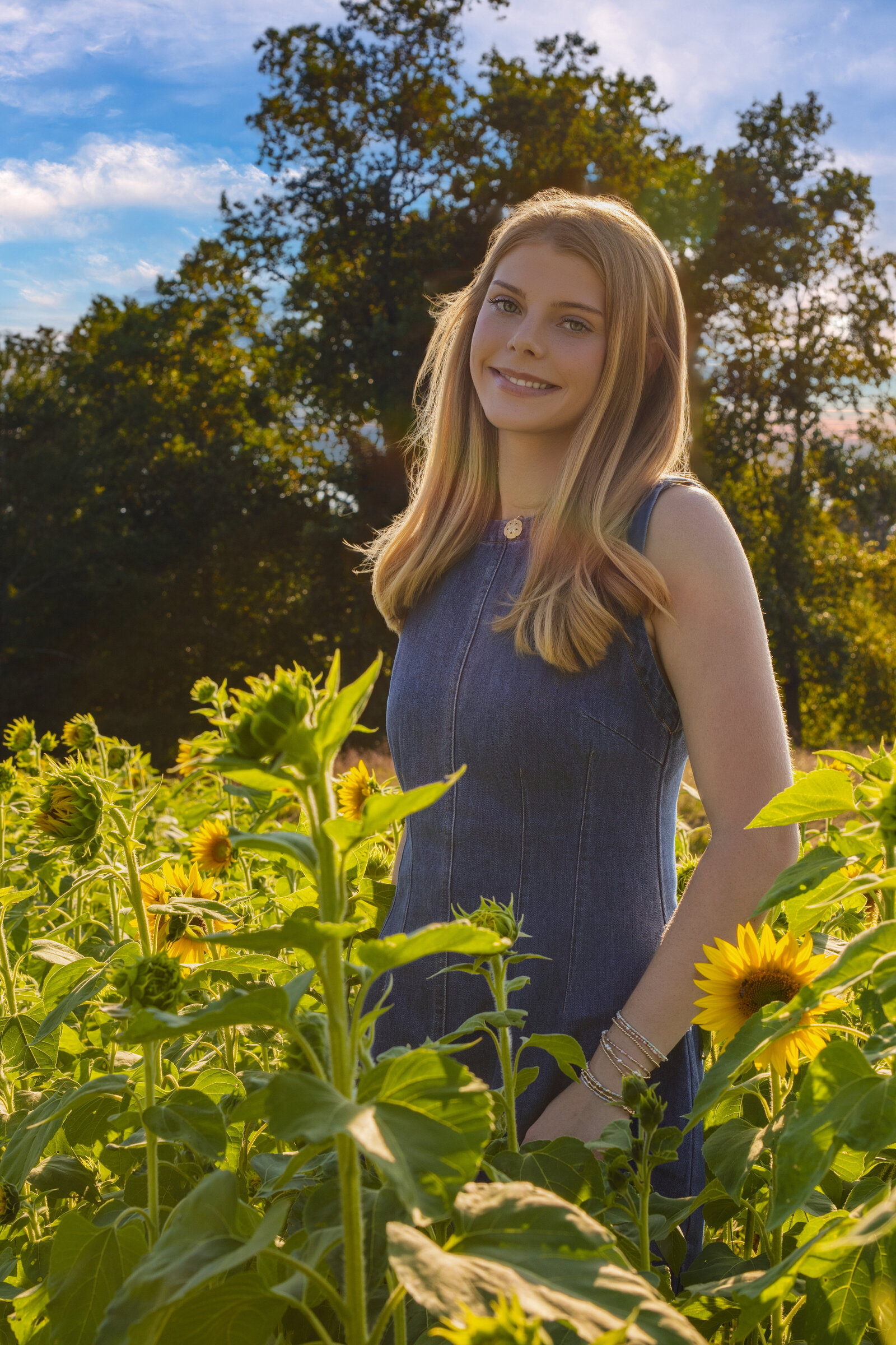 High School Atlanta Senior in sunflower fields 