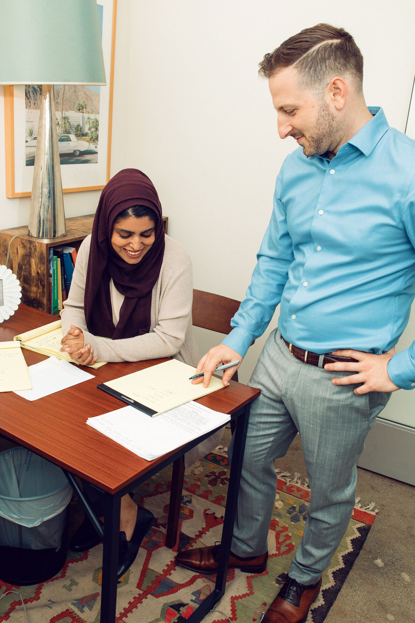 Business Portrait Of Man In Sky Blue Long Sleeves Polo And a Woman In Muslim Wear Los Angeles