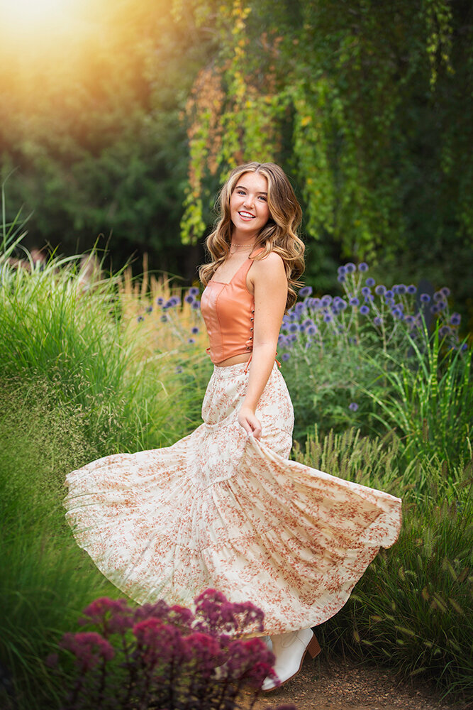 golden-light-senior-girl-twirling-dress-ornamental-grass-joy-happy-cherry-creek