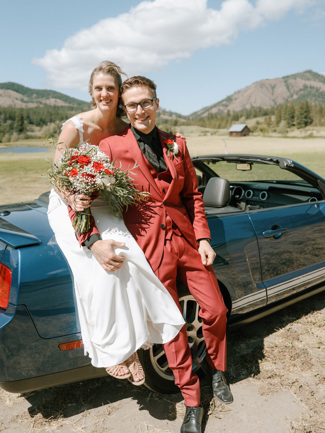 Bride and groom portrait on a mustang.