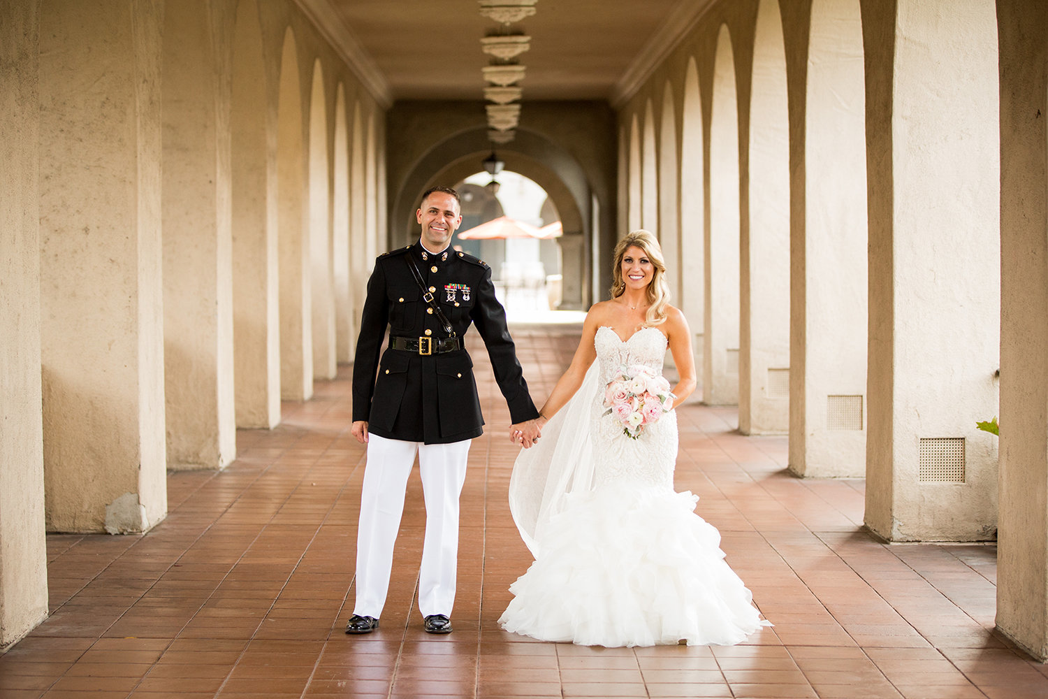 bride in groom in balboa park for their prado wedding