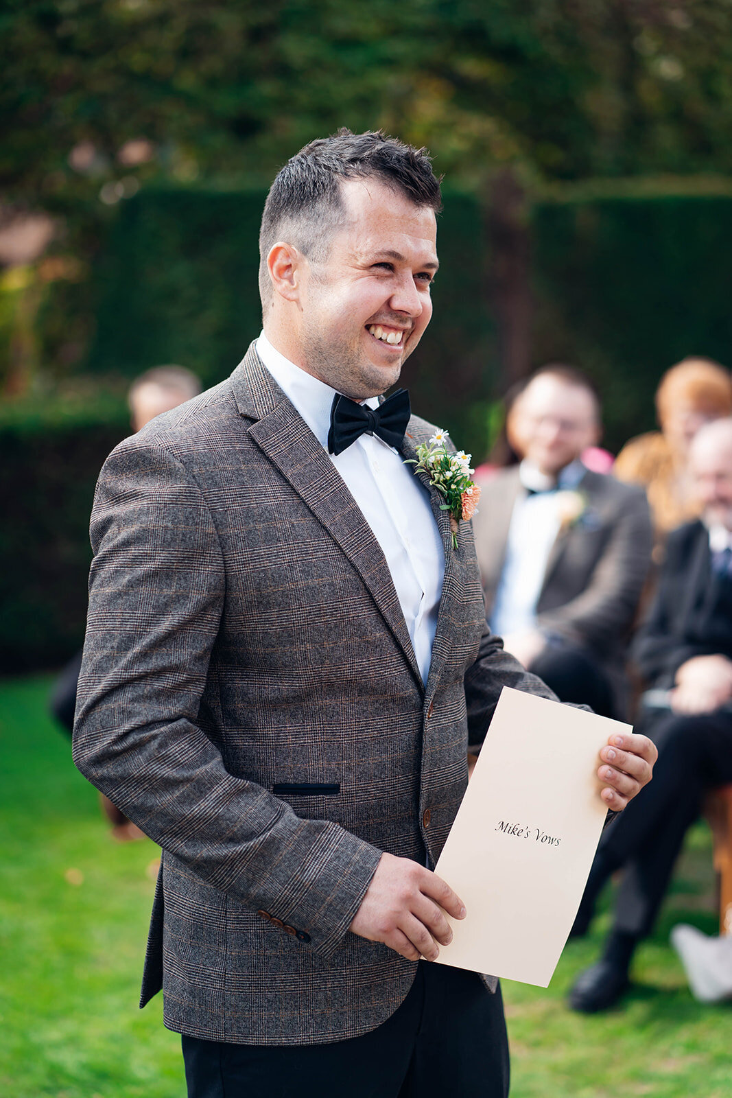 groom-reading-vows-during-caswell-house-wedding-ceremony
