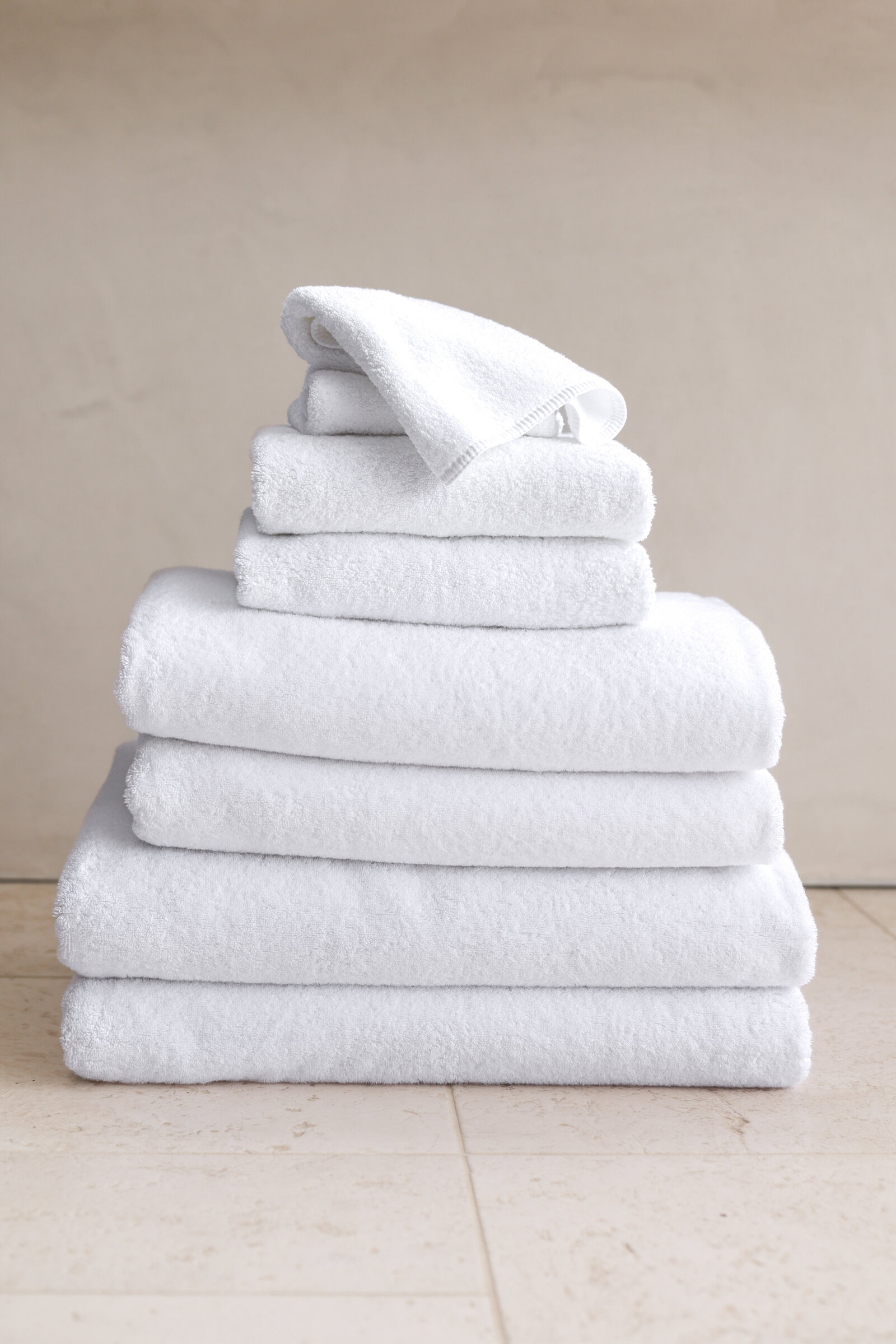 Commercial Lifestyle product photography ecommerce for luxurious organic towels washcloths bedding linen company brooklinen