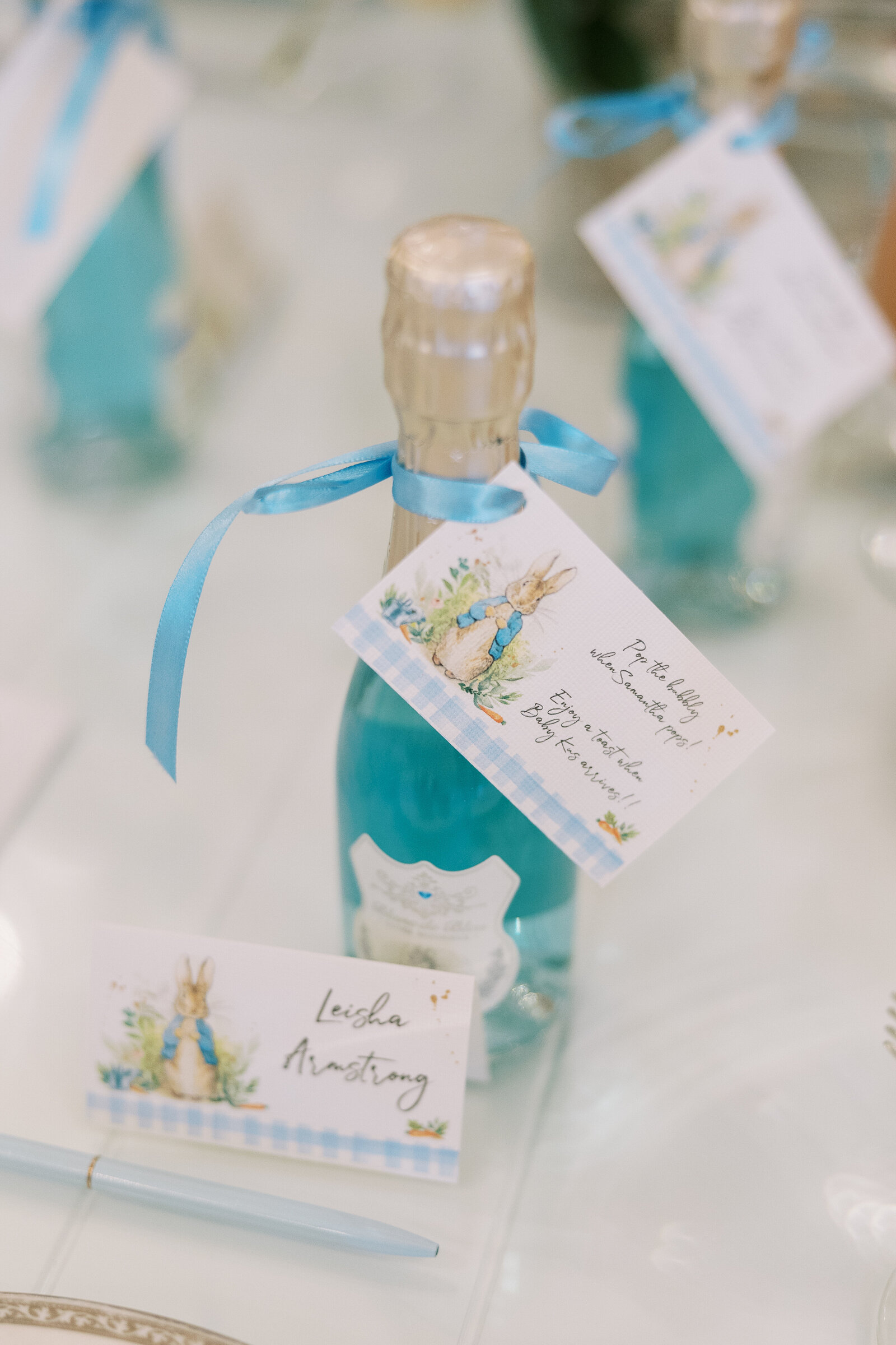 photo of mini champagne bottle party favors for a baby shower at Cake Bake in Carmel, Indiana