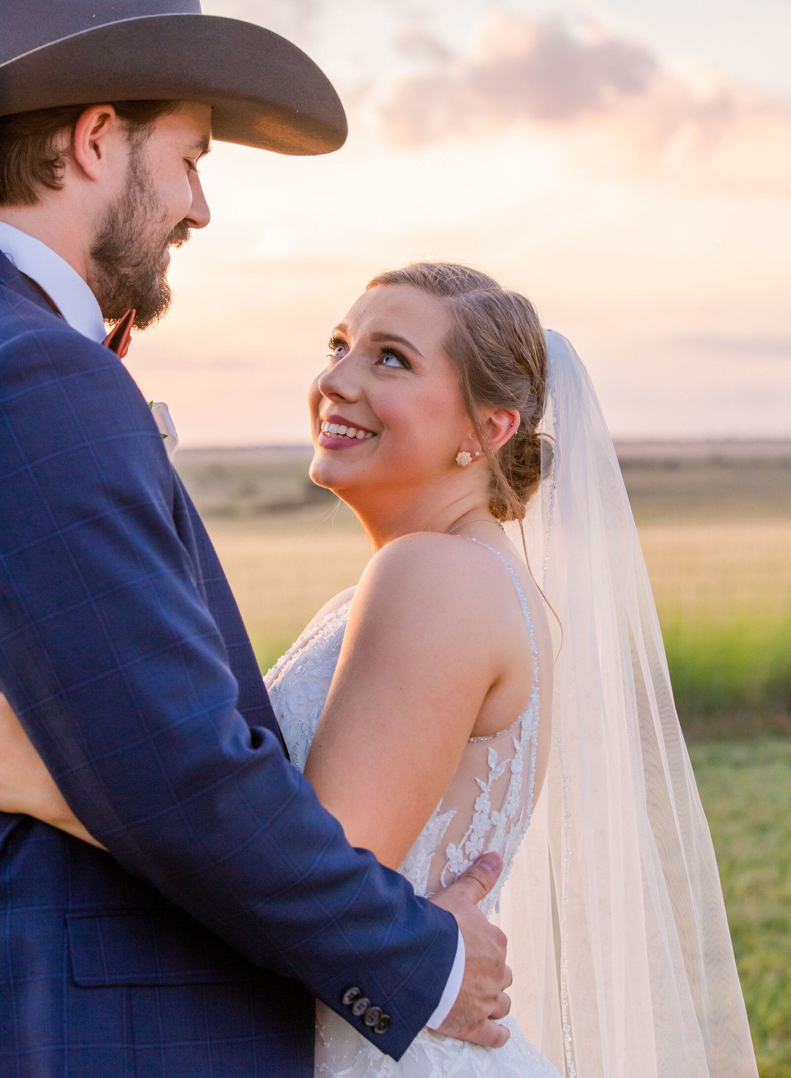 bride smiling at groom