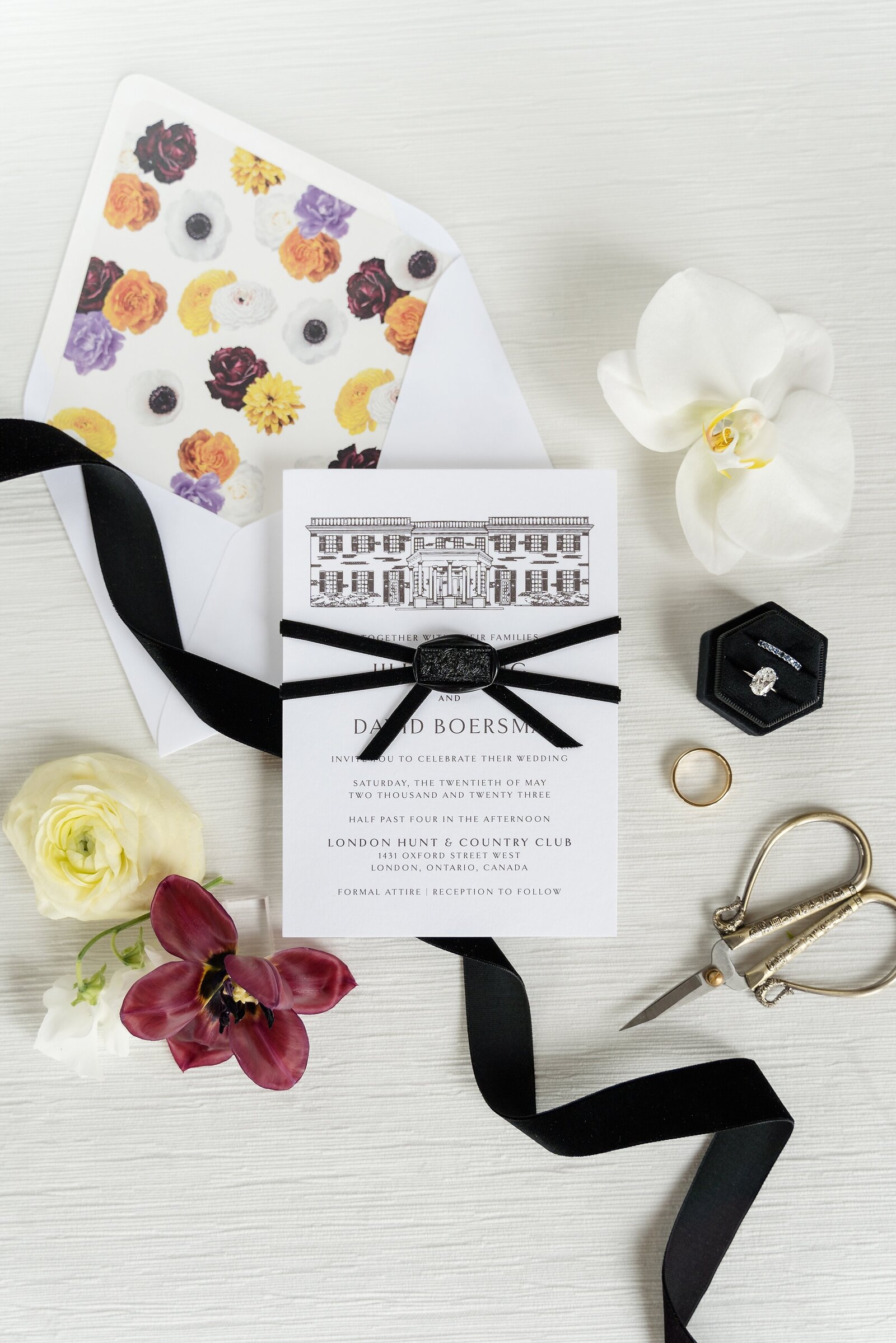 Black-white-and-colour-wedding-invitation-suite-flat-lay-london-hunt-club-wedding
