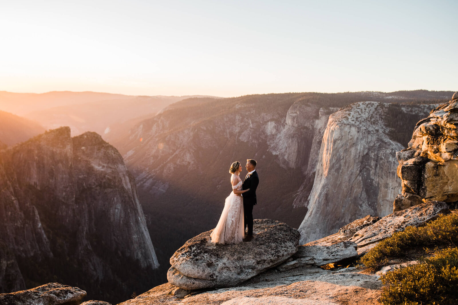 A couple embraces in Yosemite