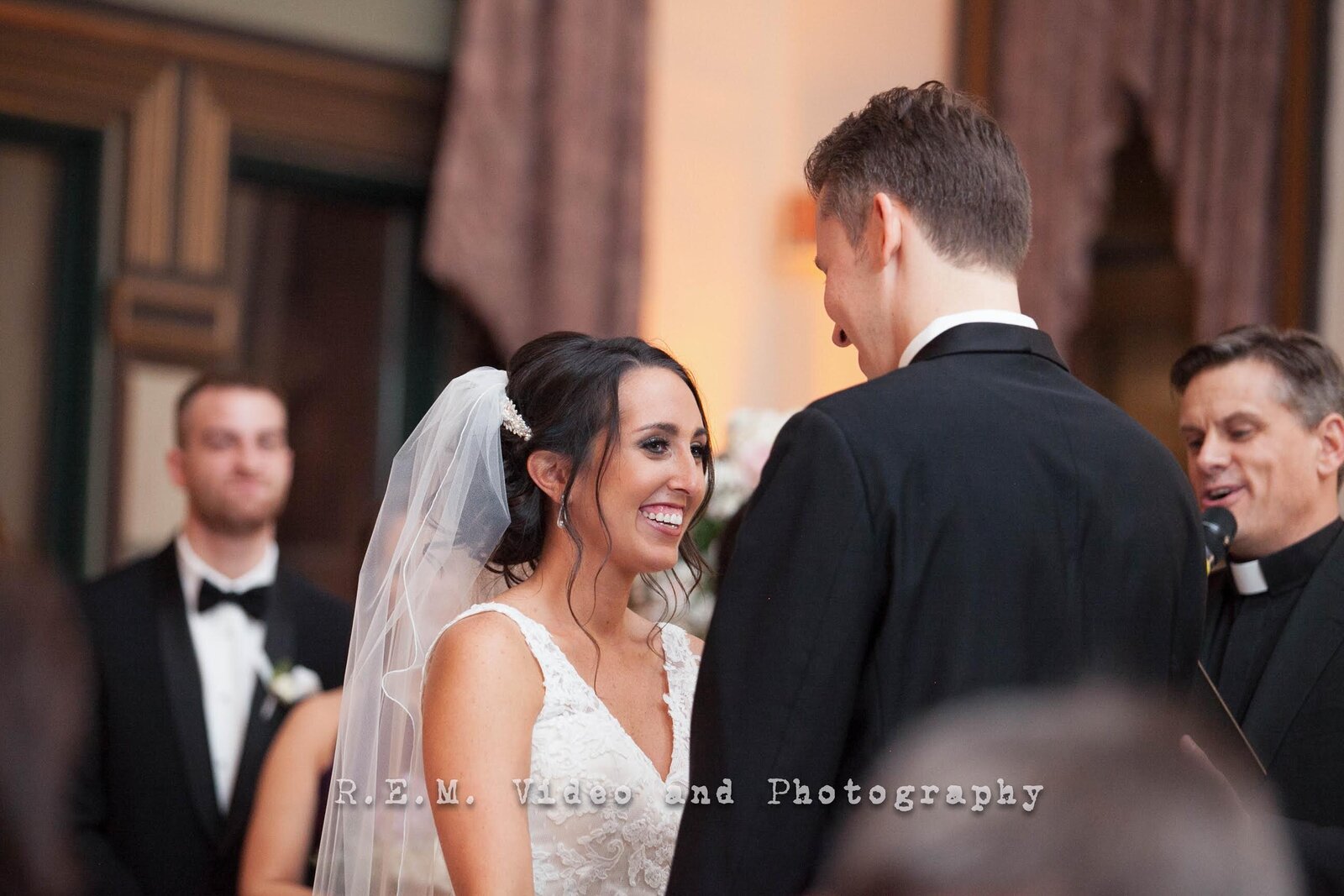 Bride smiles during wedding ceremony