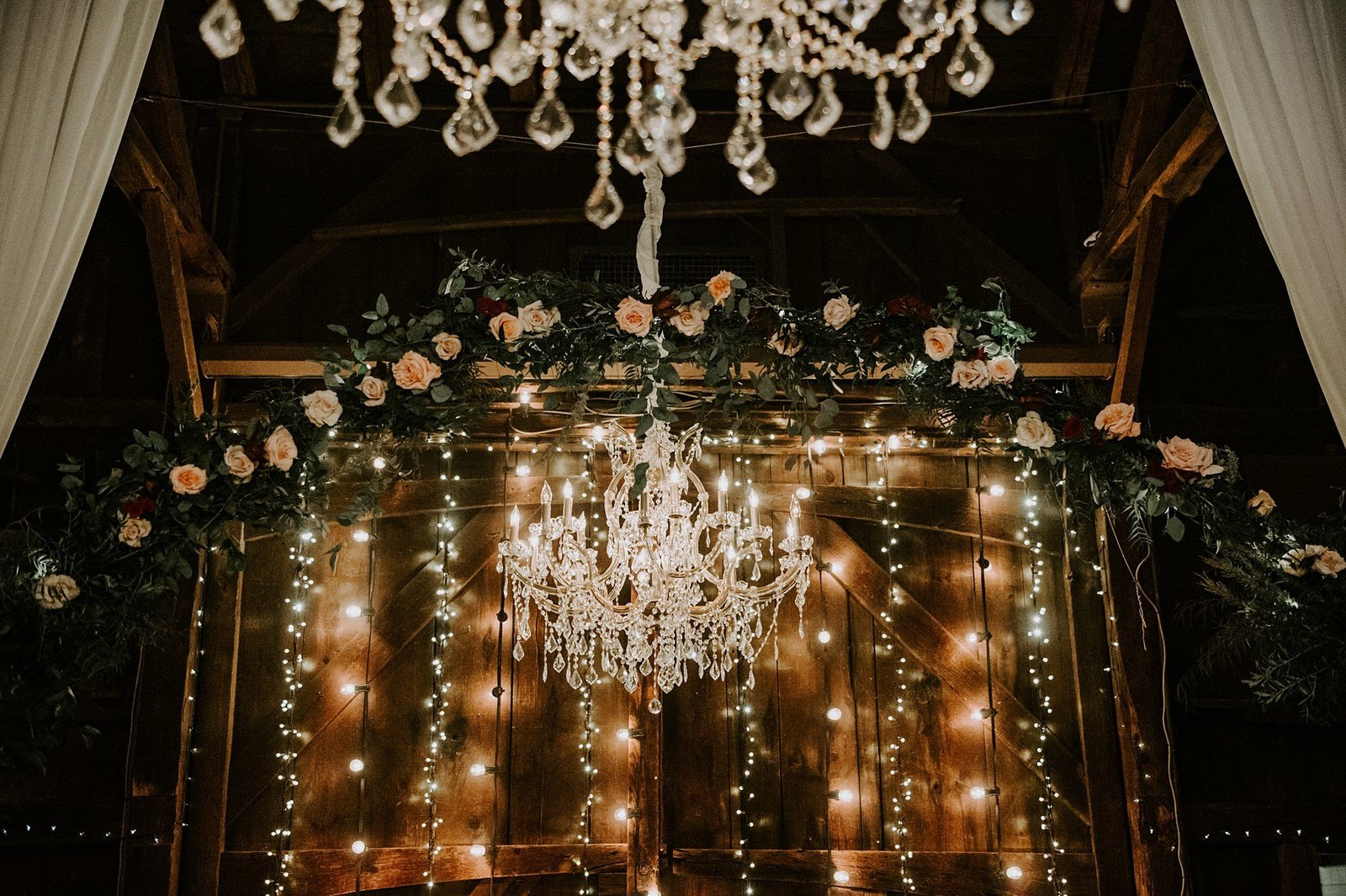 Rustic & romantic wedding at The Webb Barn with draping and chandeliers in Wethersfield, CT