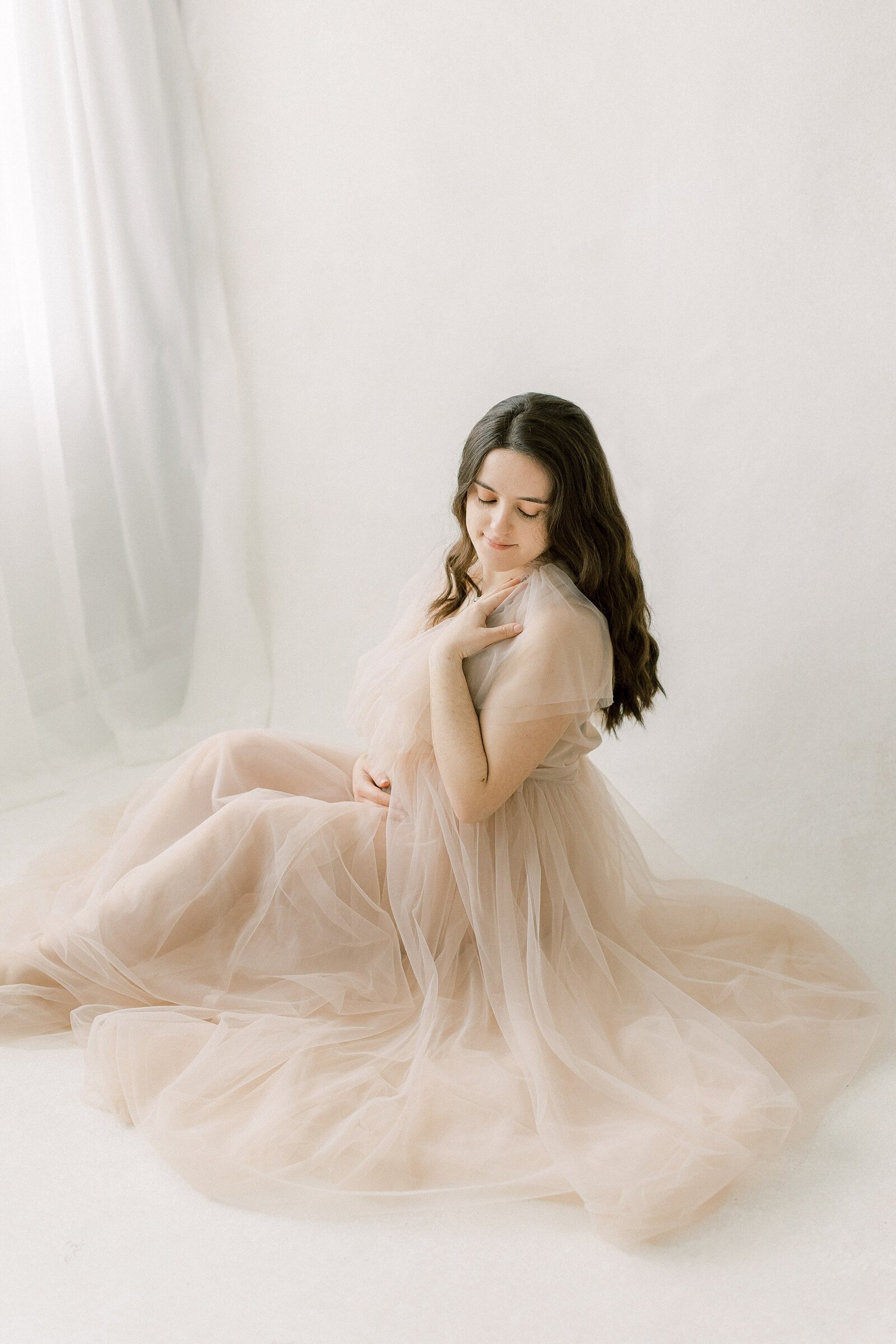 intimate maternity session in Lancaster, PA with tulle dresses and lace