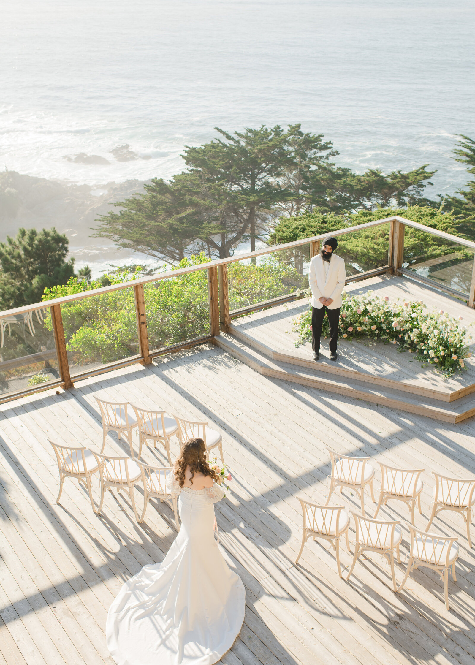 bride walking to her groom at their wedding ceremony first look in monterey