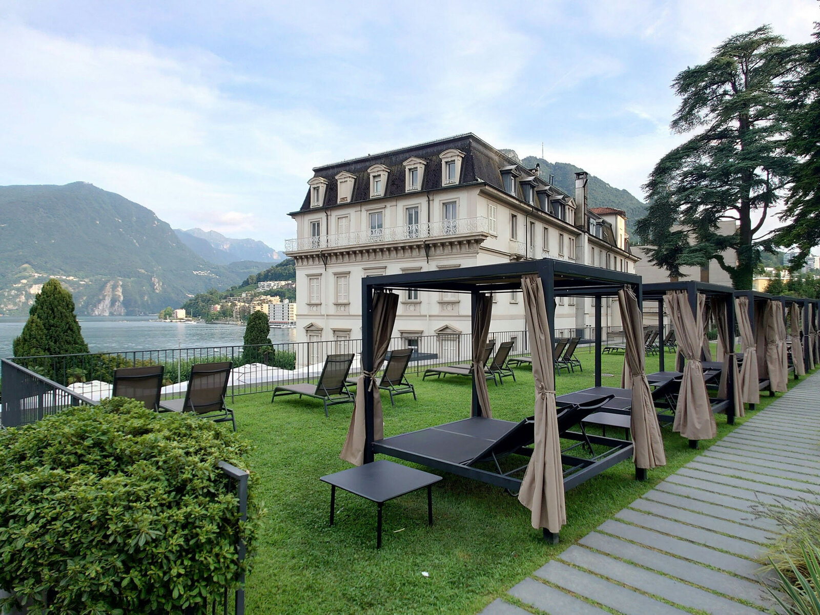 Large building with a lot of chairs in front of it