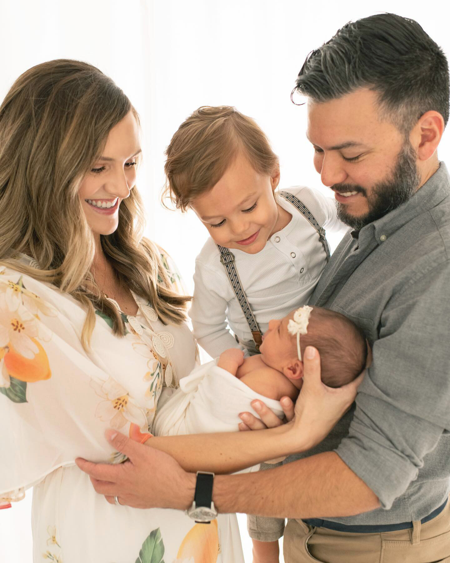 Family together toddler with newborn 