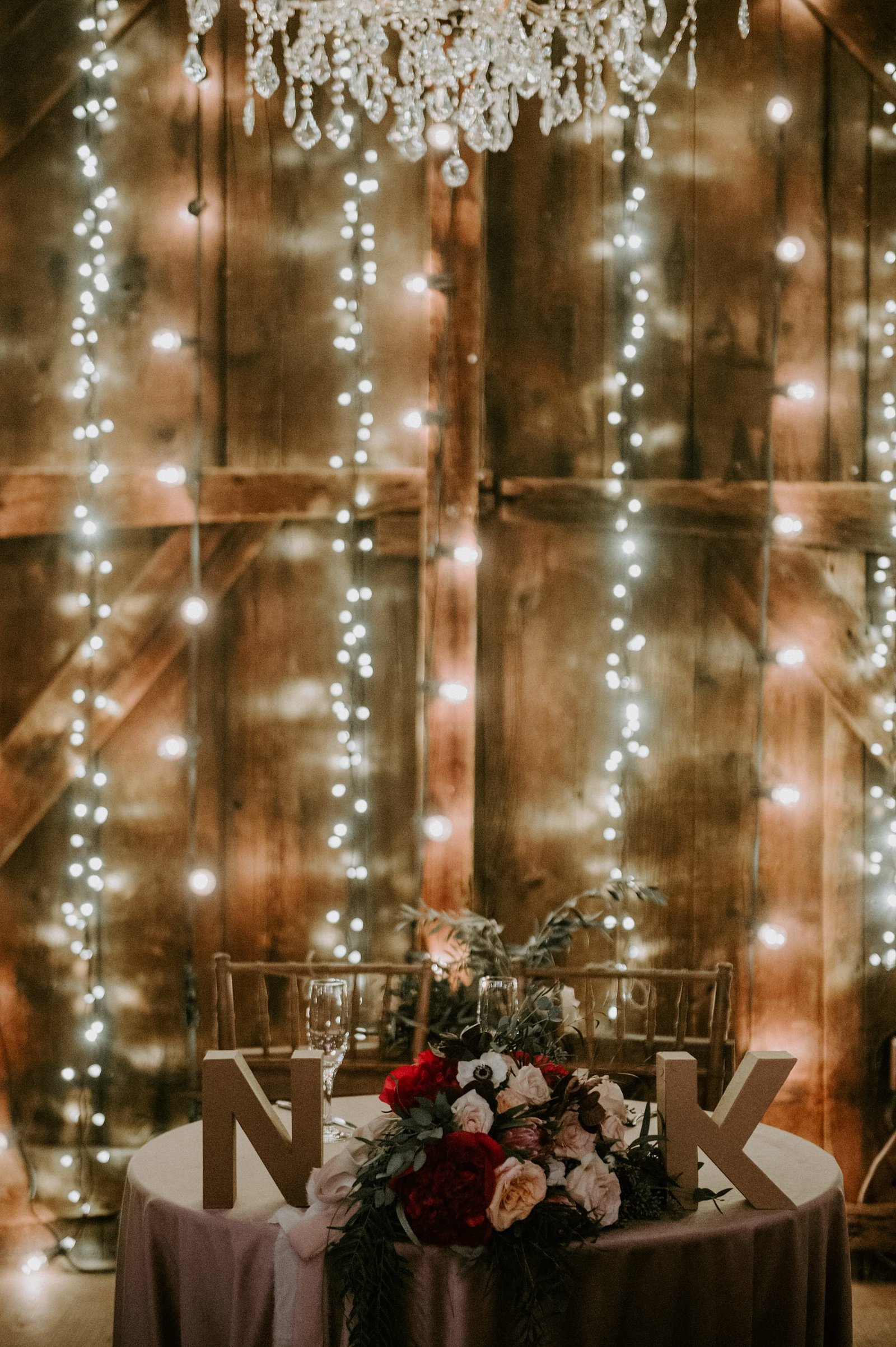 Rustic & romantic wedding at The Webb Barn with draping and chandeliers in Wethersfield, CT