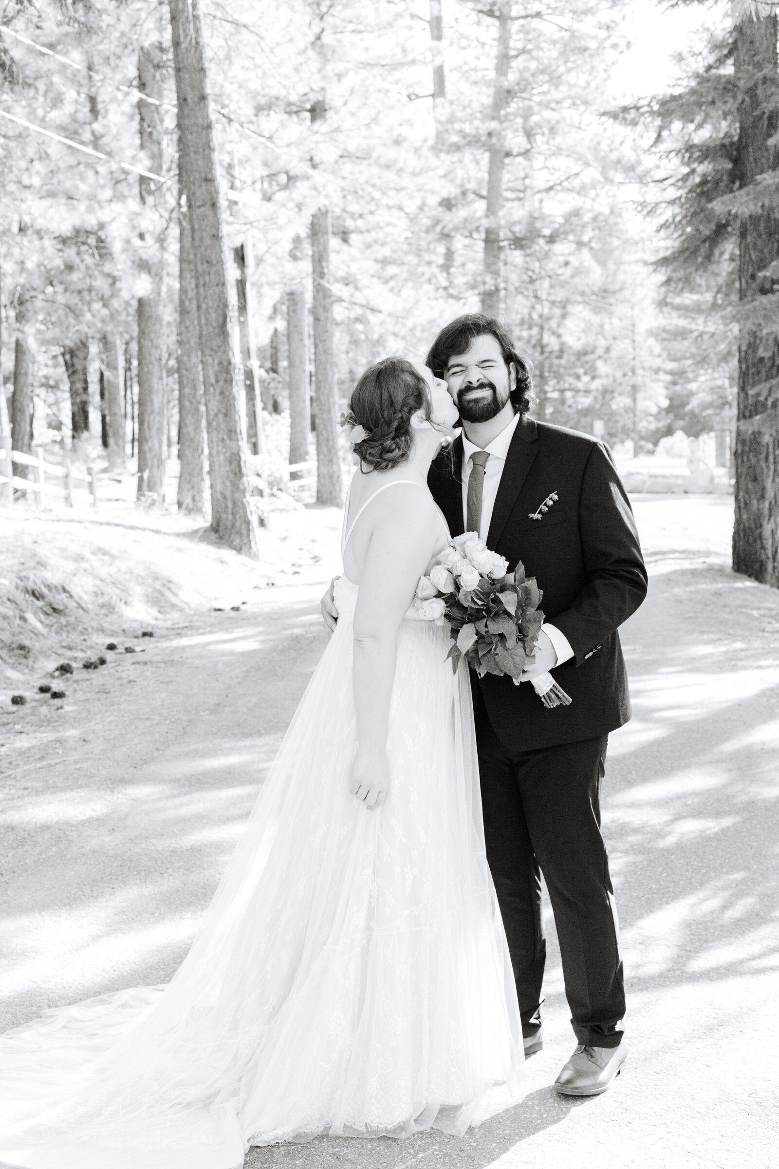 A couple celebrates their intimate elopement at a cabin at Big Bear Lake, California.