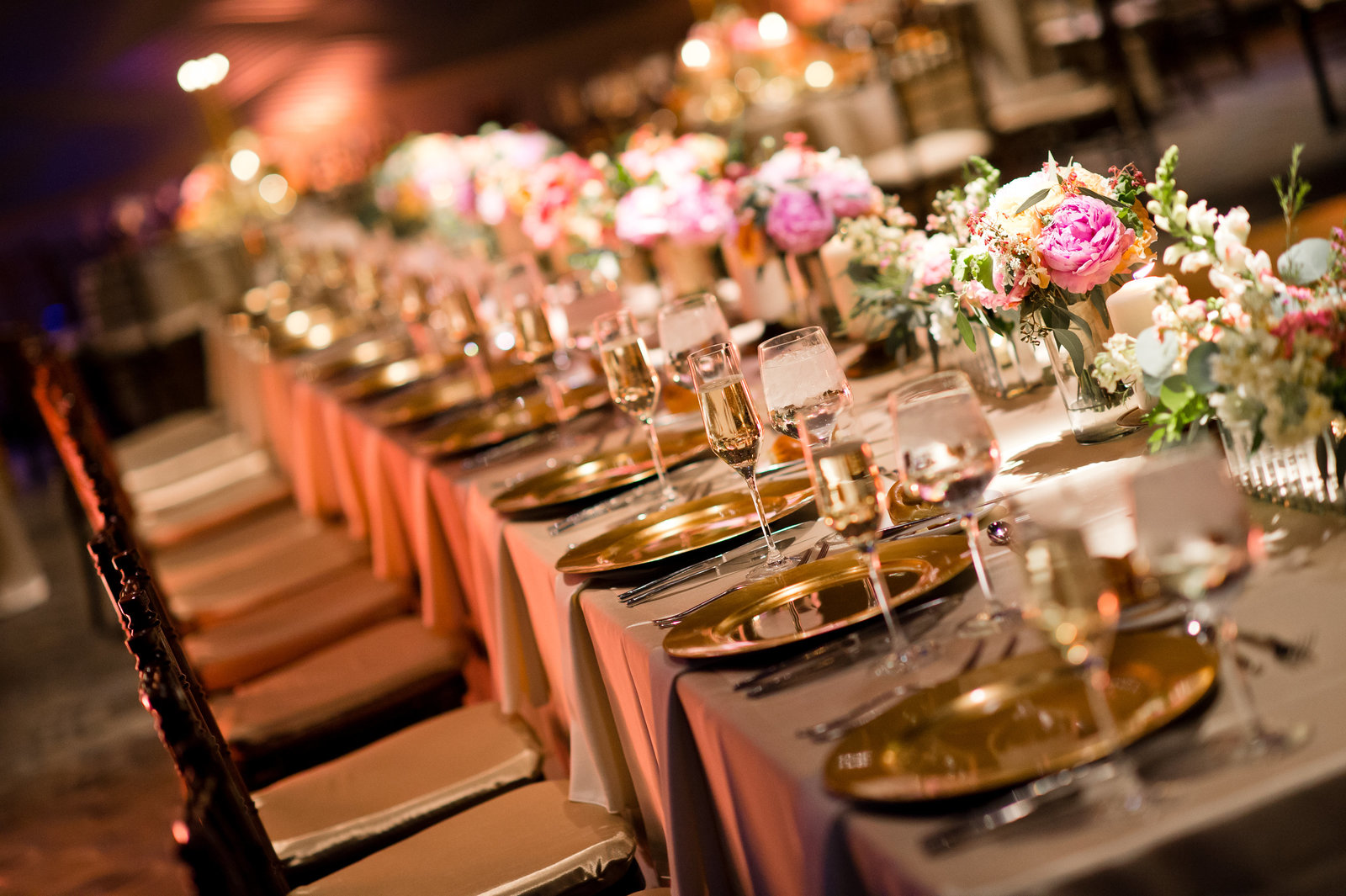 Estate table wedding decor and florals by A Garden Party Florist photo by Amanda Young Photography at Adventure Aquarium Currents Ballroom