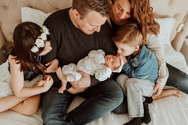 newborn photograph y with family in Vancouver