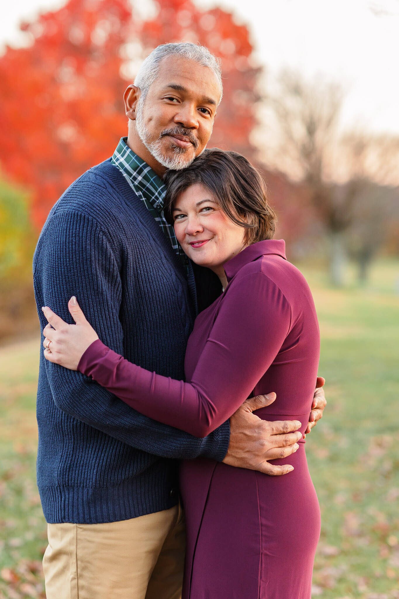 A close-up of a couple hugging
