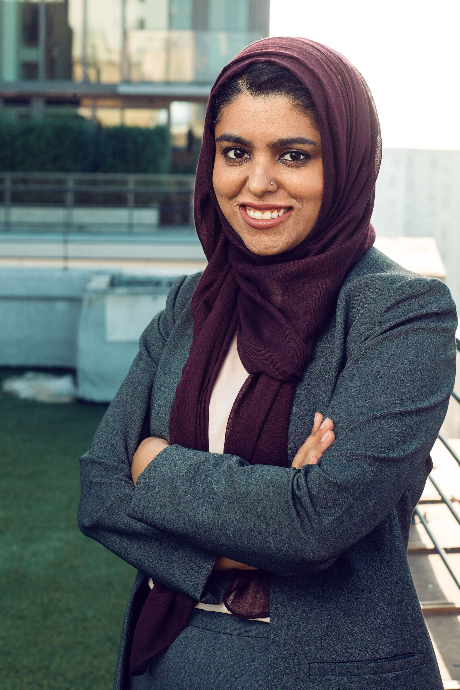 Business Portrait Of Woman In Gray Suit And Violet Hijab Los Angeles