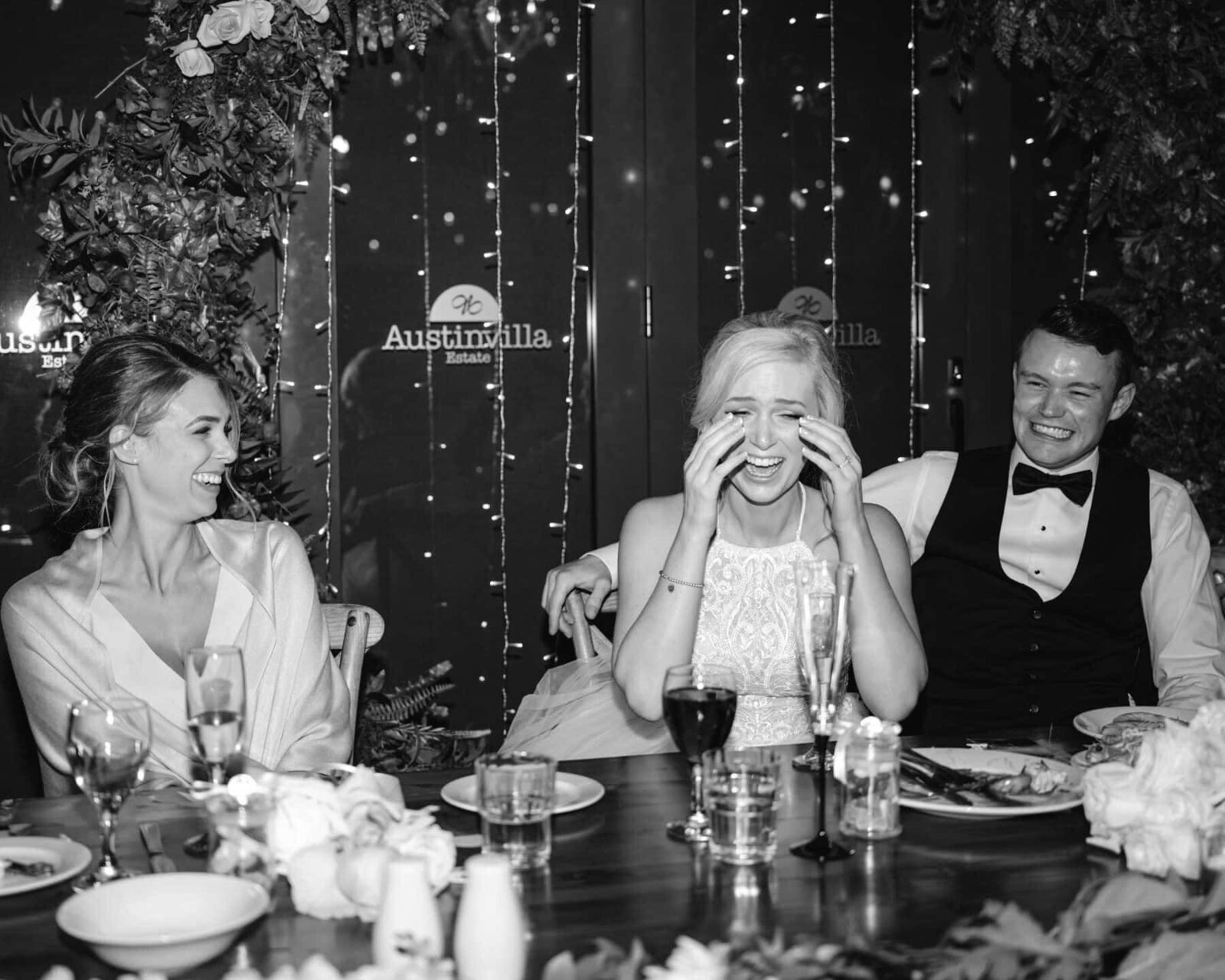 Bride and groom at the table at the wedding reception at Austinvilla Estate