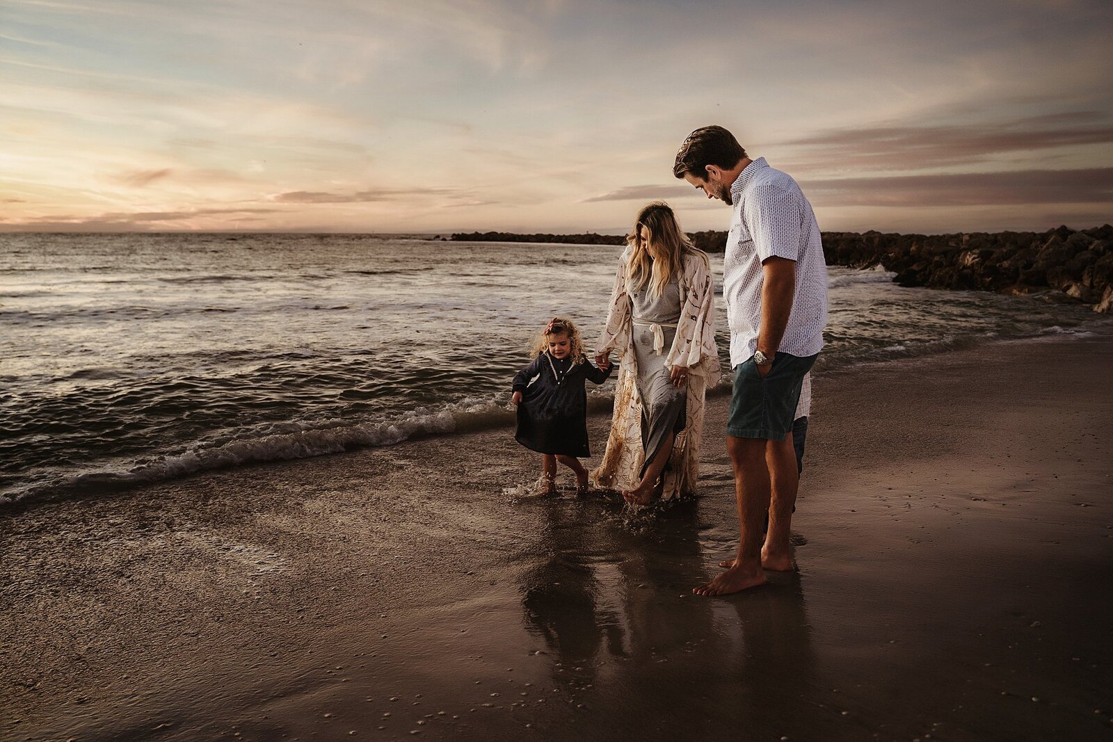 Family session during sunset on Clearwater Beach