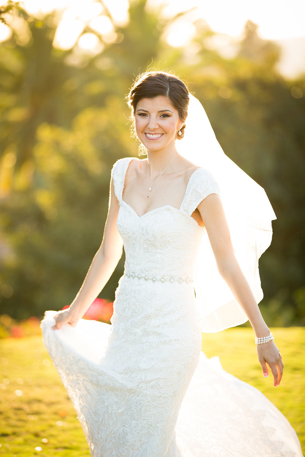 Bride twirls her dress at Rancho Valencia