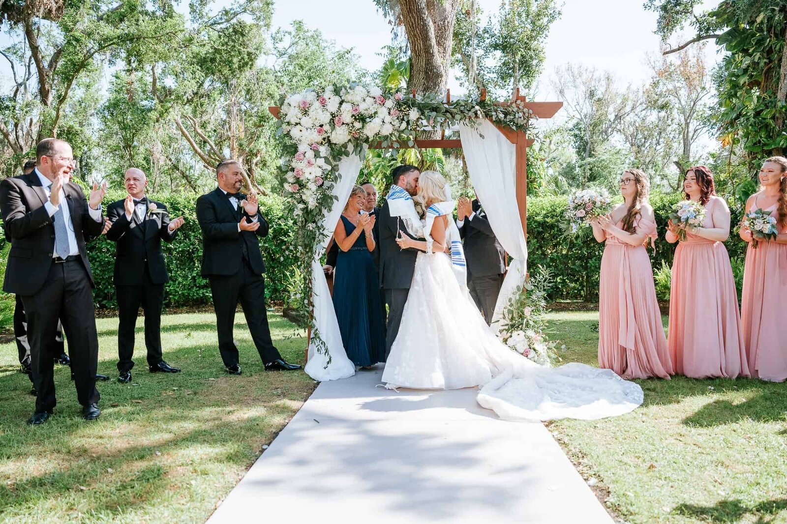 Bride and Groom's first kiss at their Bakers Ranch Wedding Ceremony