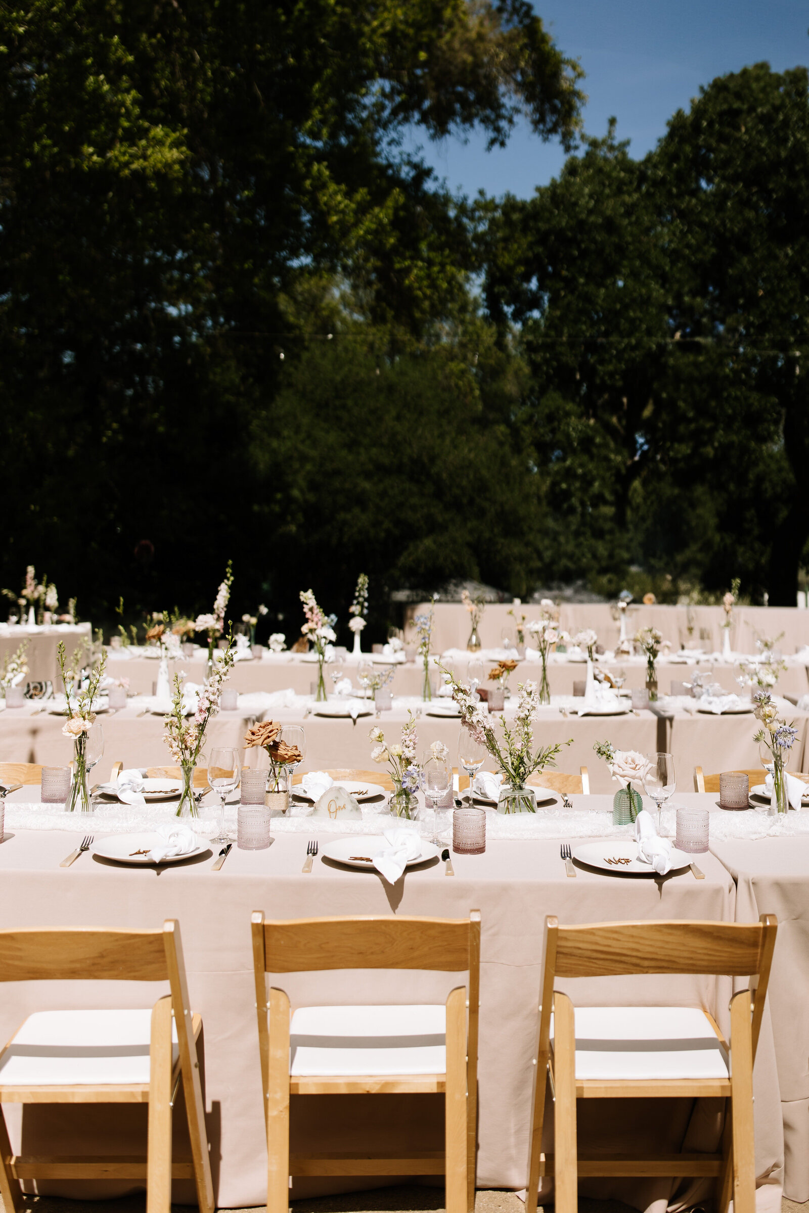 Outdoor wildflower tablescape details at McCall wedding venue