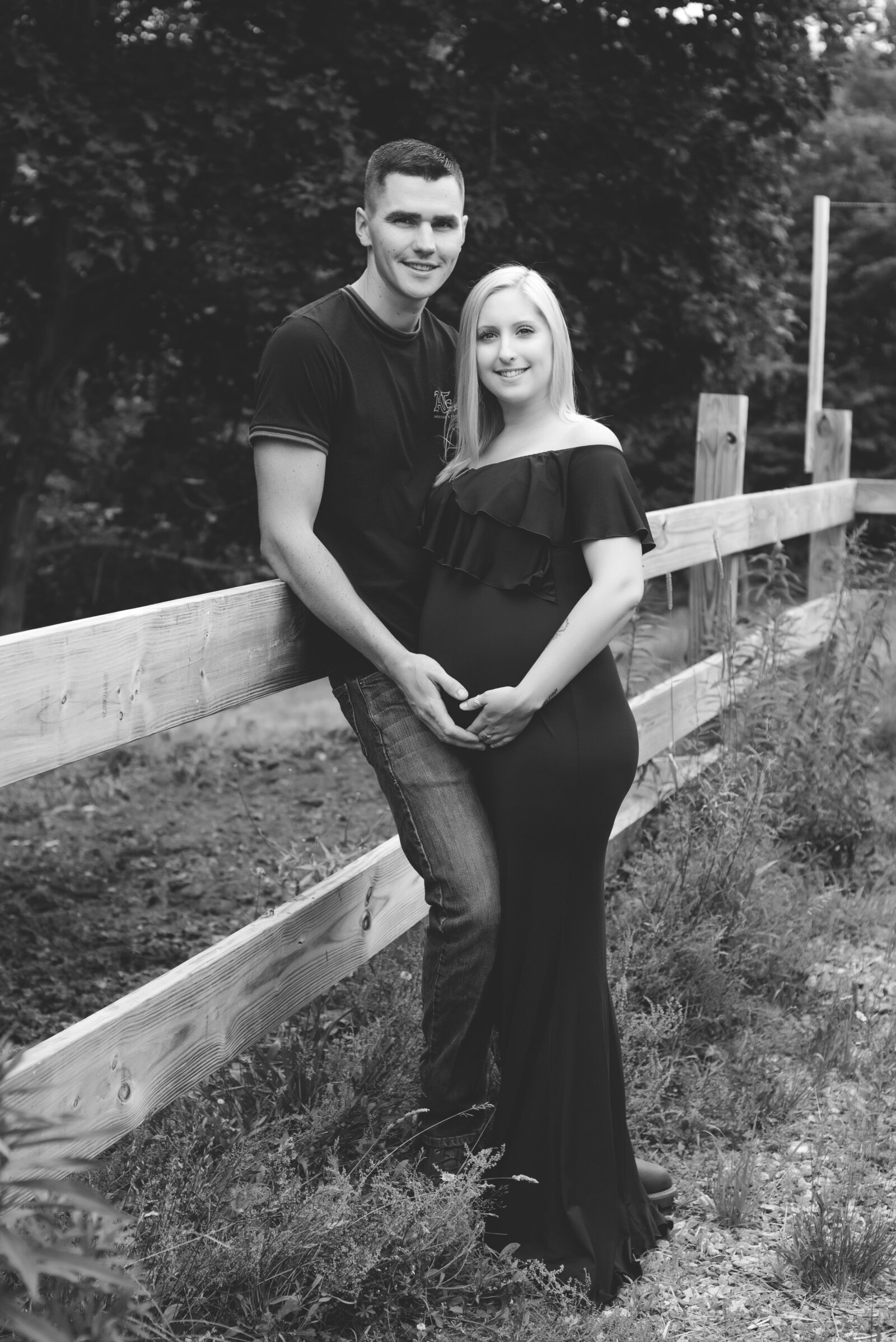 Maternity photo of couple on horse farm in Springvale Maine