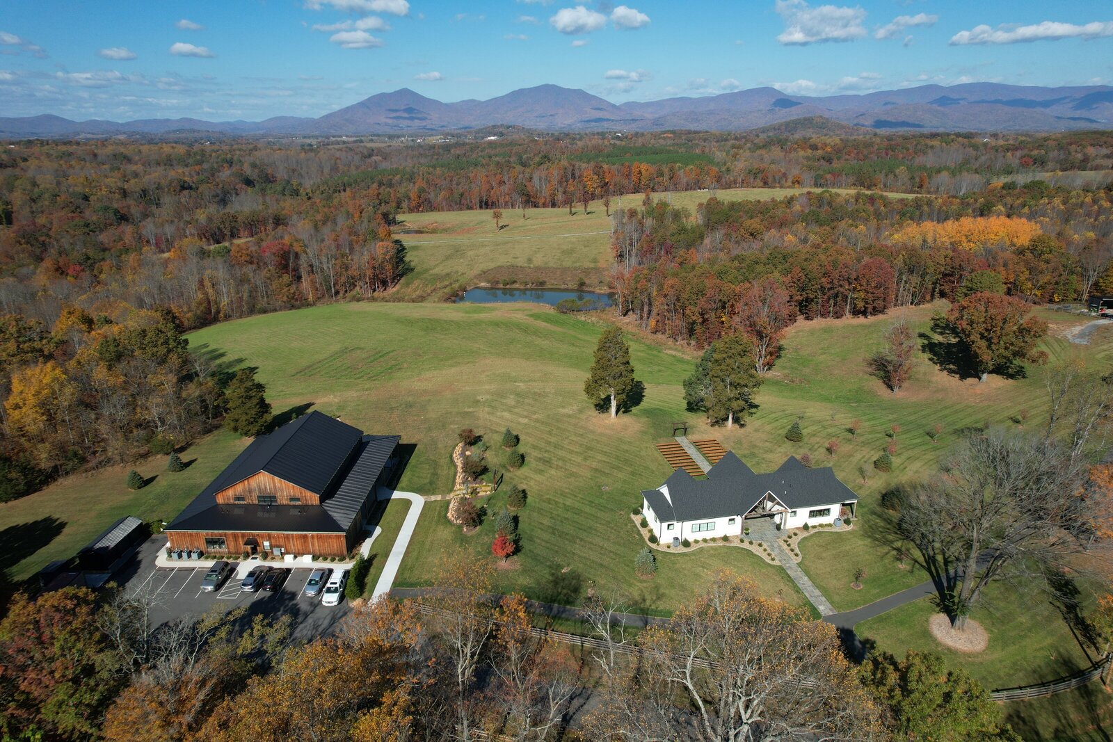 Drone shot of the view of the Blue Ridge Mountains at Cedar Oaks Farm, a wedding venue in central Virginia