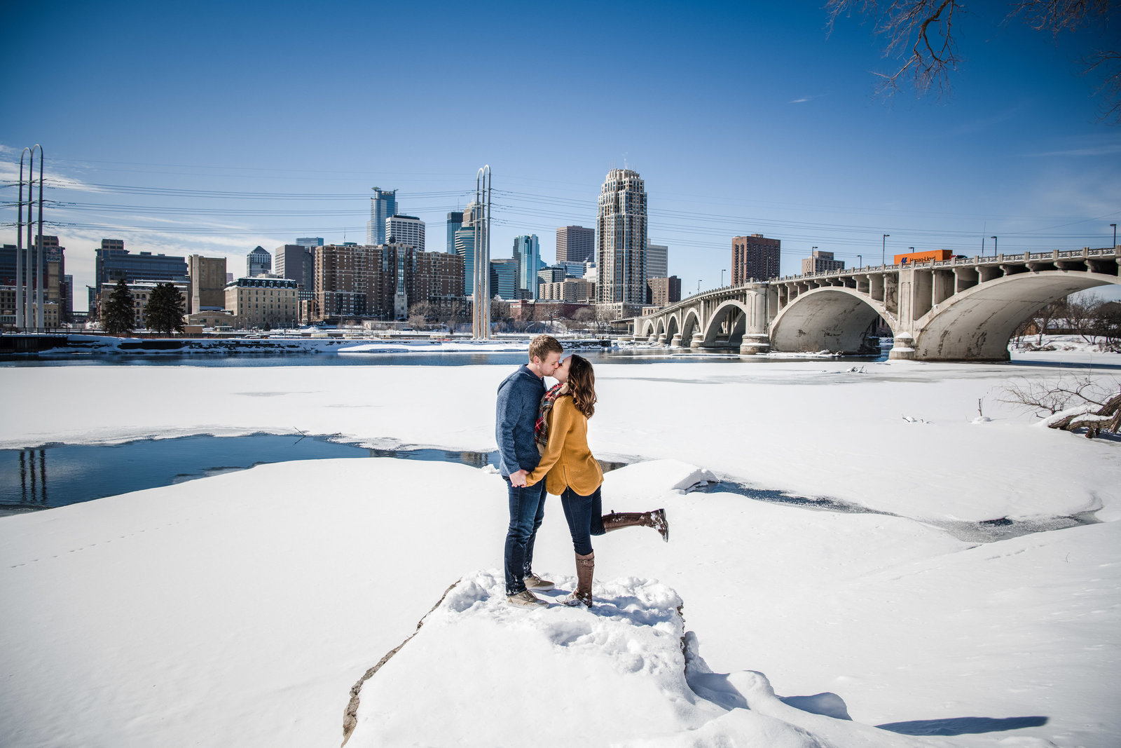 Man and woman kissing in snow
