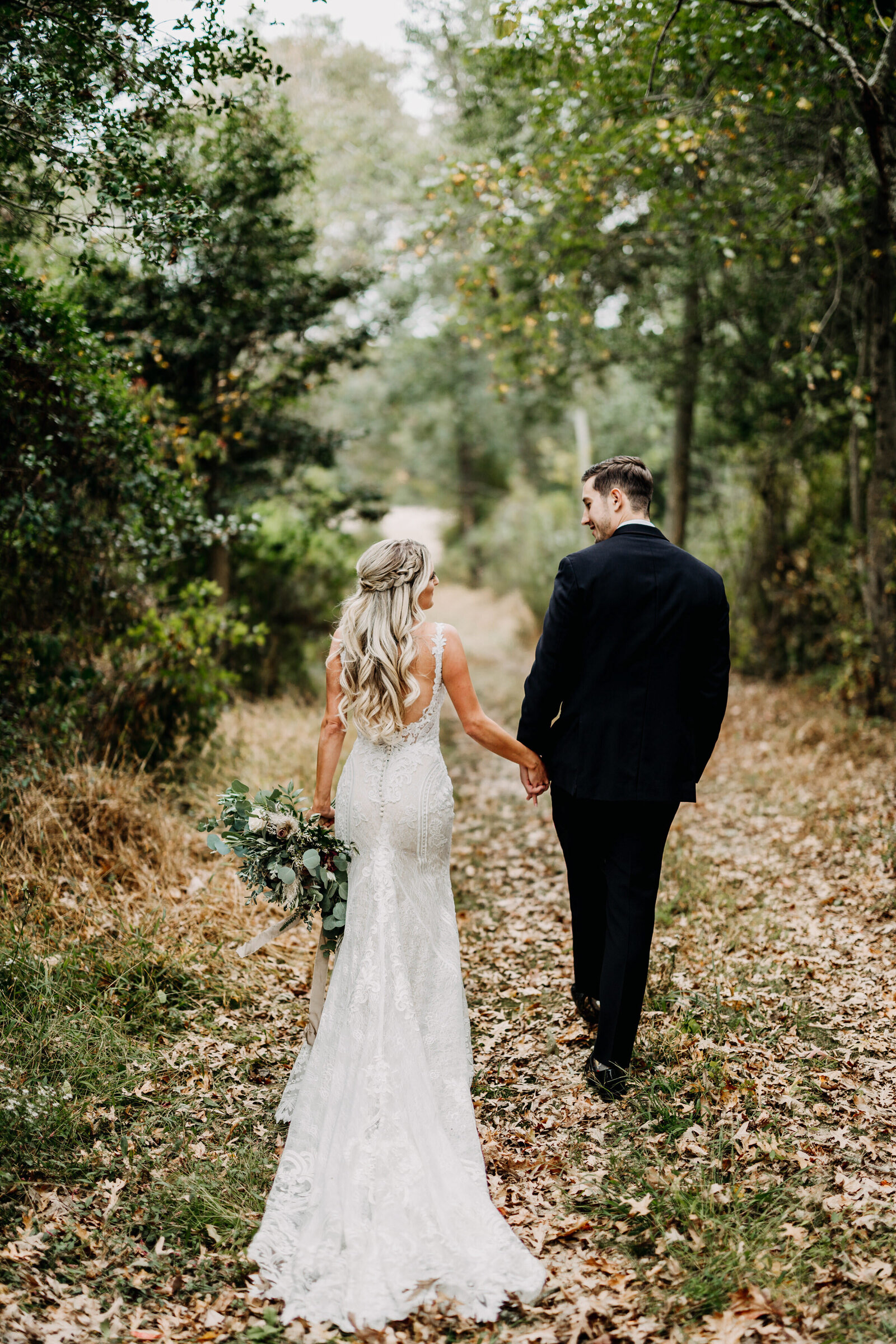 bride walking away with long dress