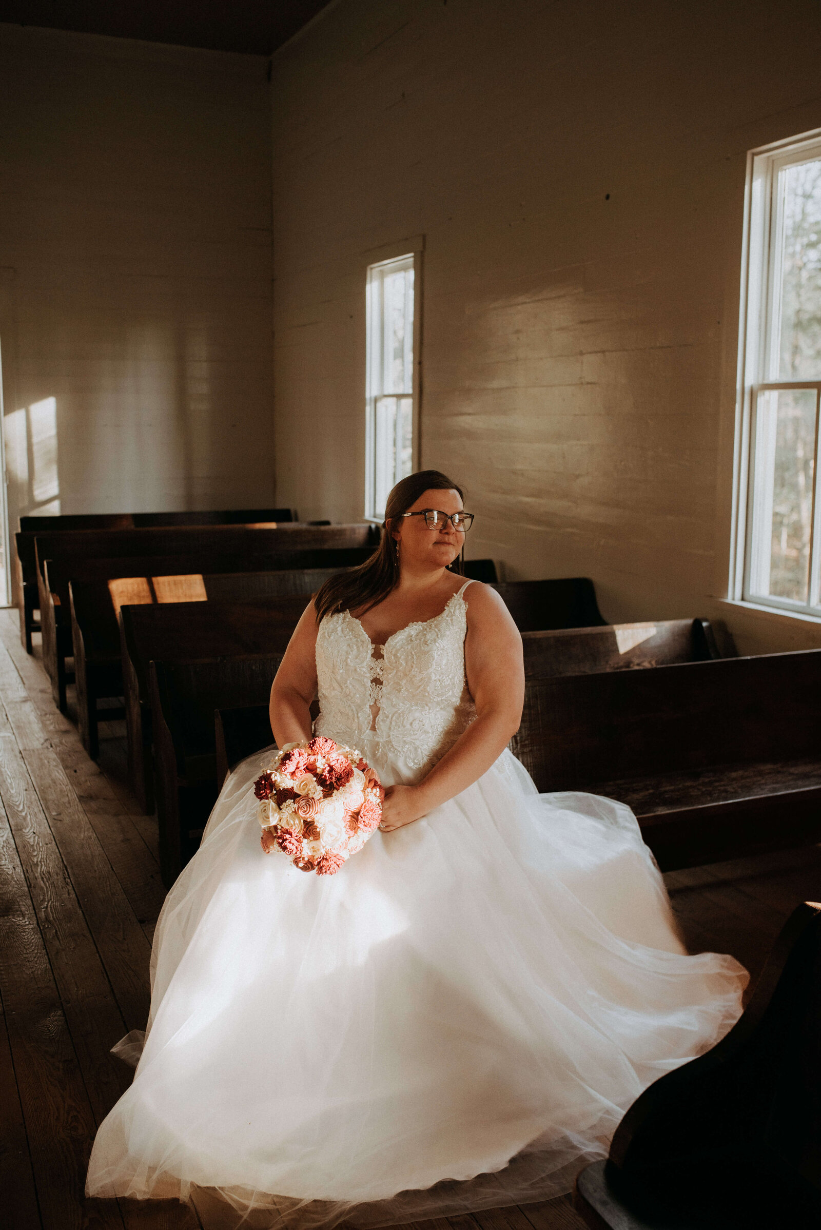 bride in lace and tulle gown