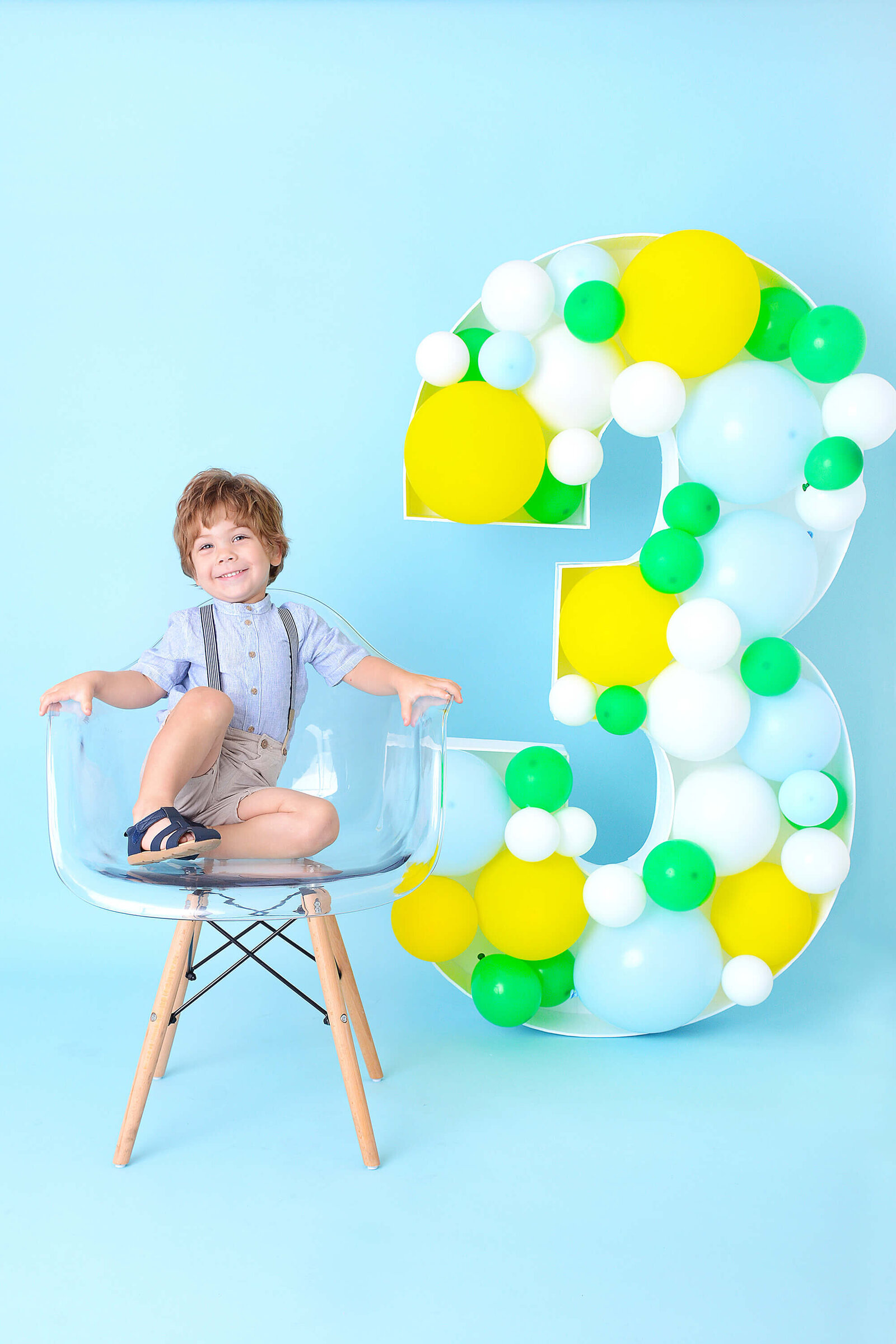 boy smiles at his 3rd birthday photography session