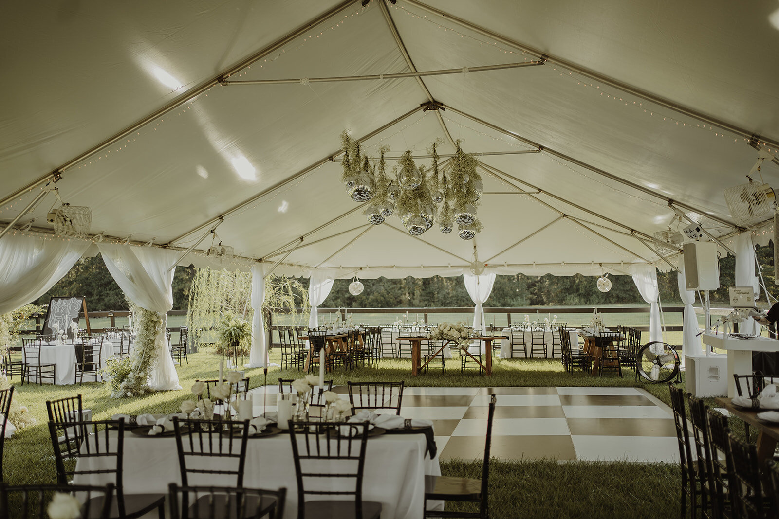 wedding design and decor for black and white tented wedding