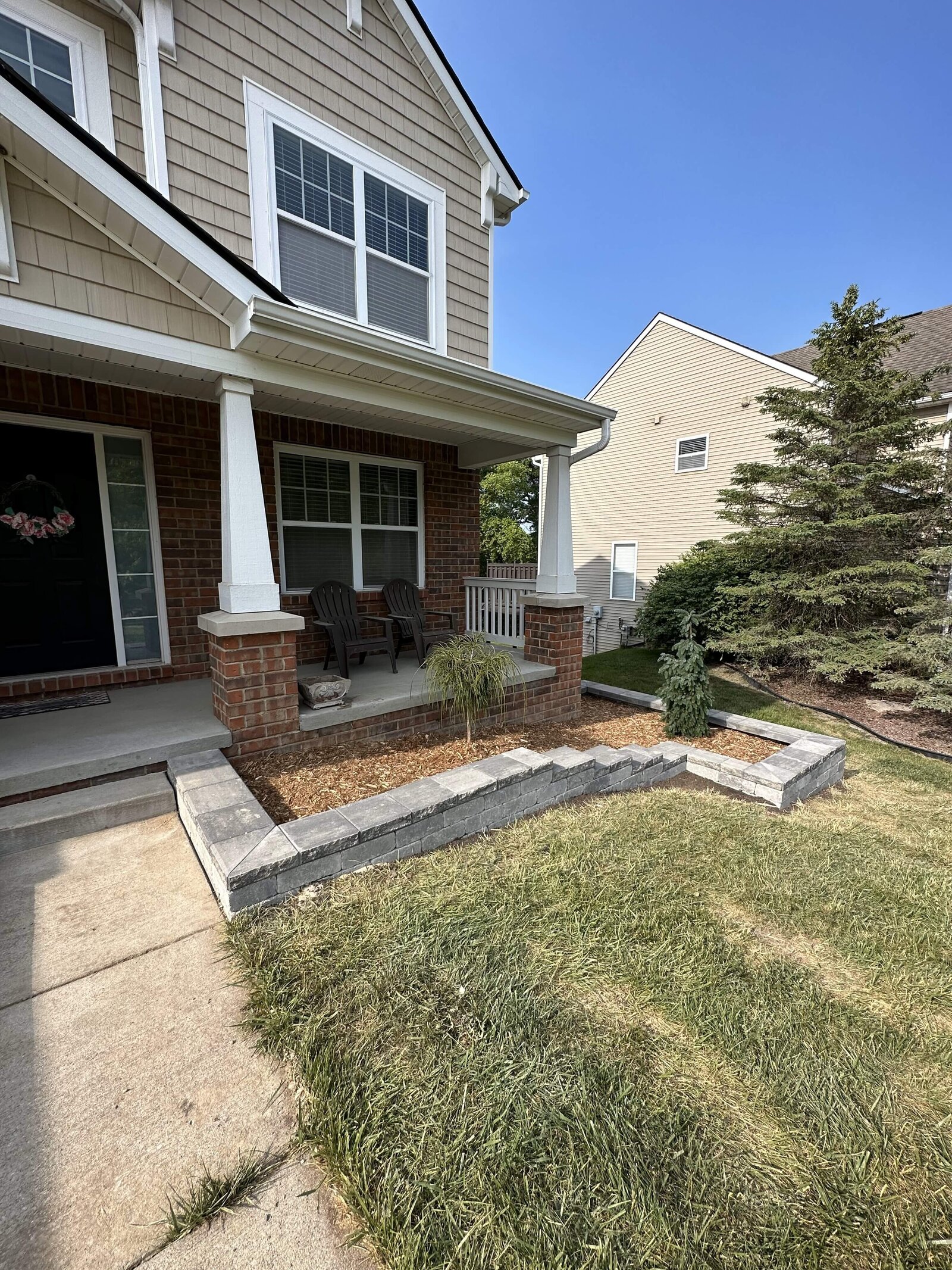 et-landscaping-mowing-work-retaining-wall-garden