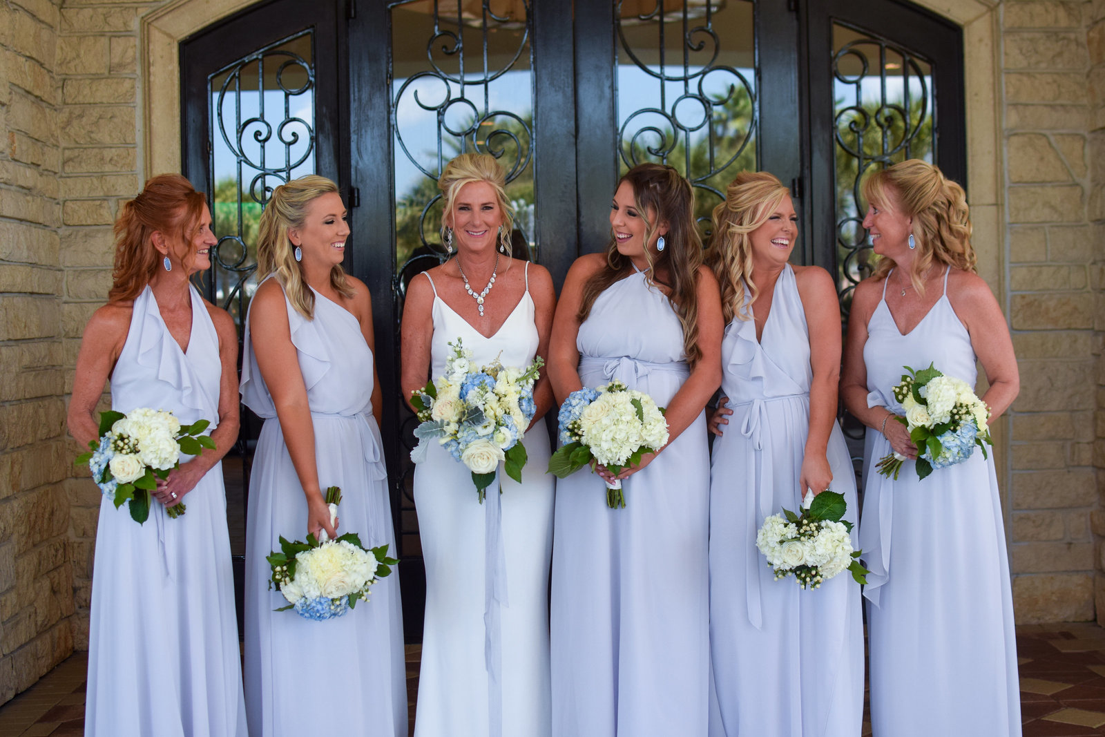 Wedding Bride and bridesmaids in lavender dresses One Ocean Resort Jacksonville Florida