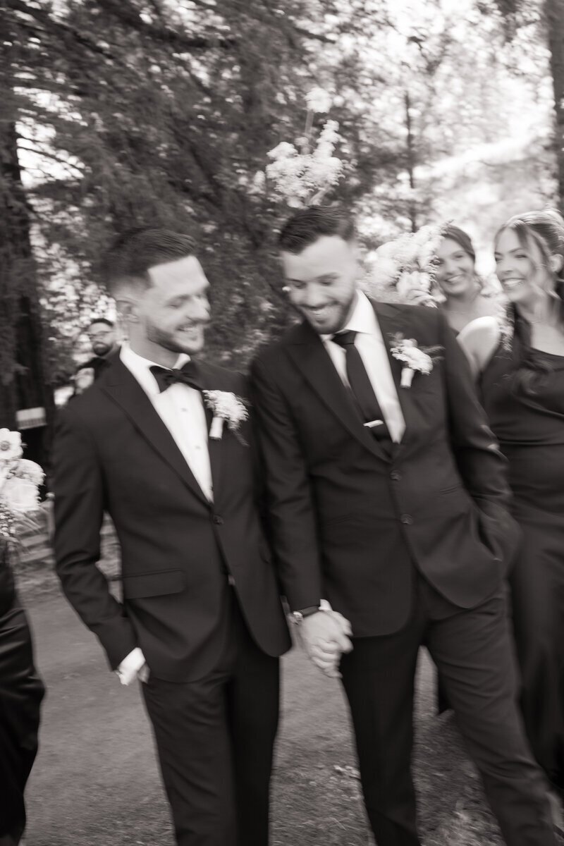 Grooms laughing taken by northern california wedding photographer