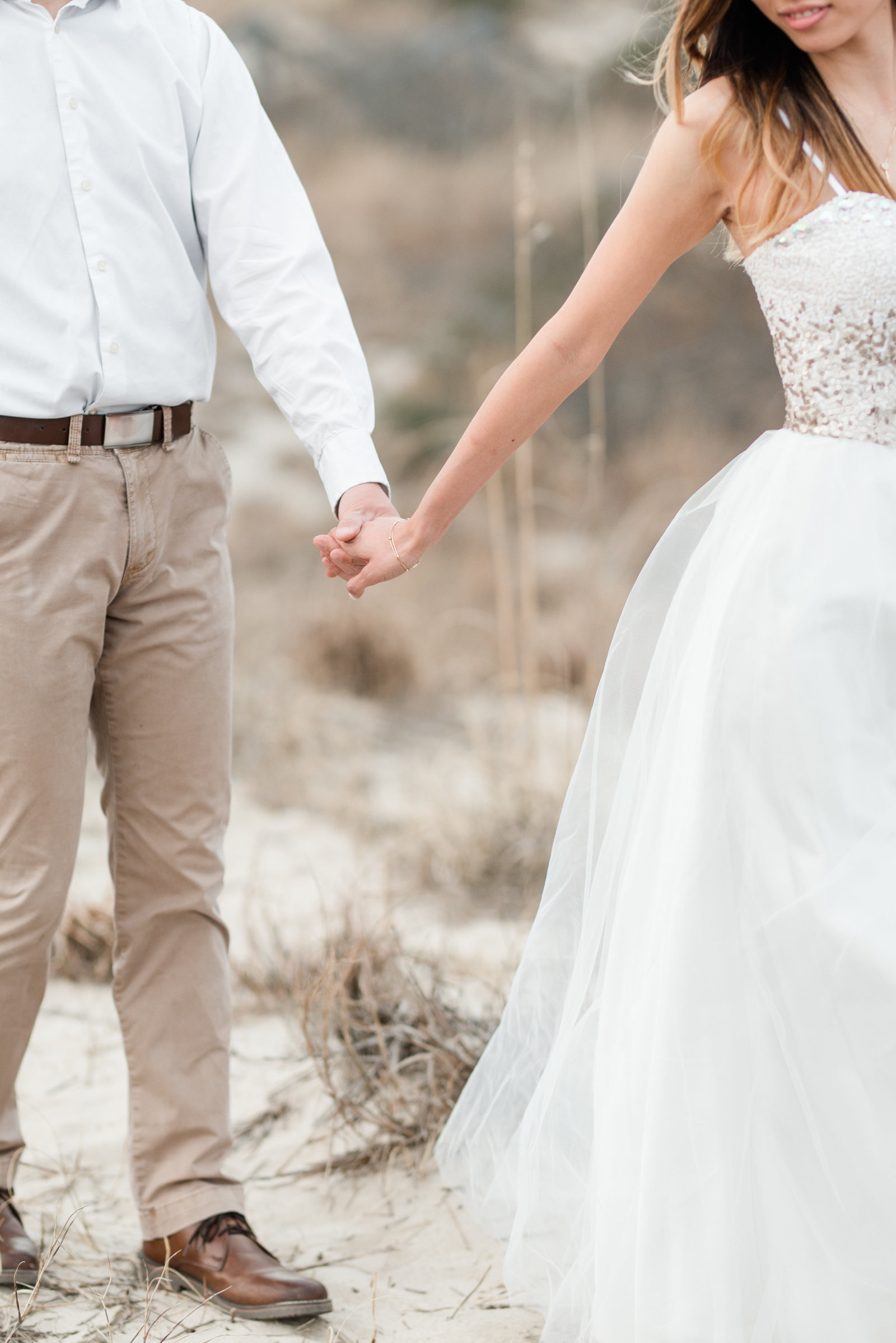 virginia beach oceanfront engagement session tulle dress by norfolk wedding photographer